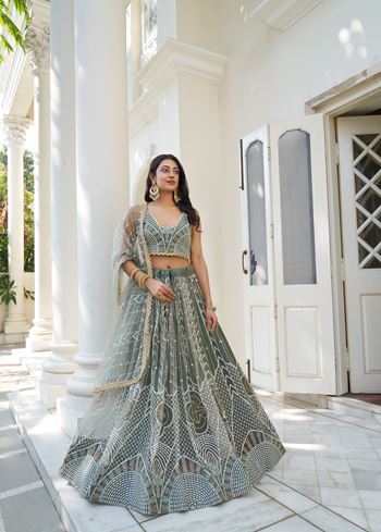 DustyGreen Butterfly Net Lehenga Choli With Designer Thread Work, Zari Work And Sequence Work
