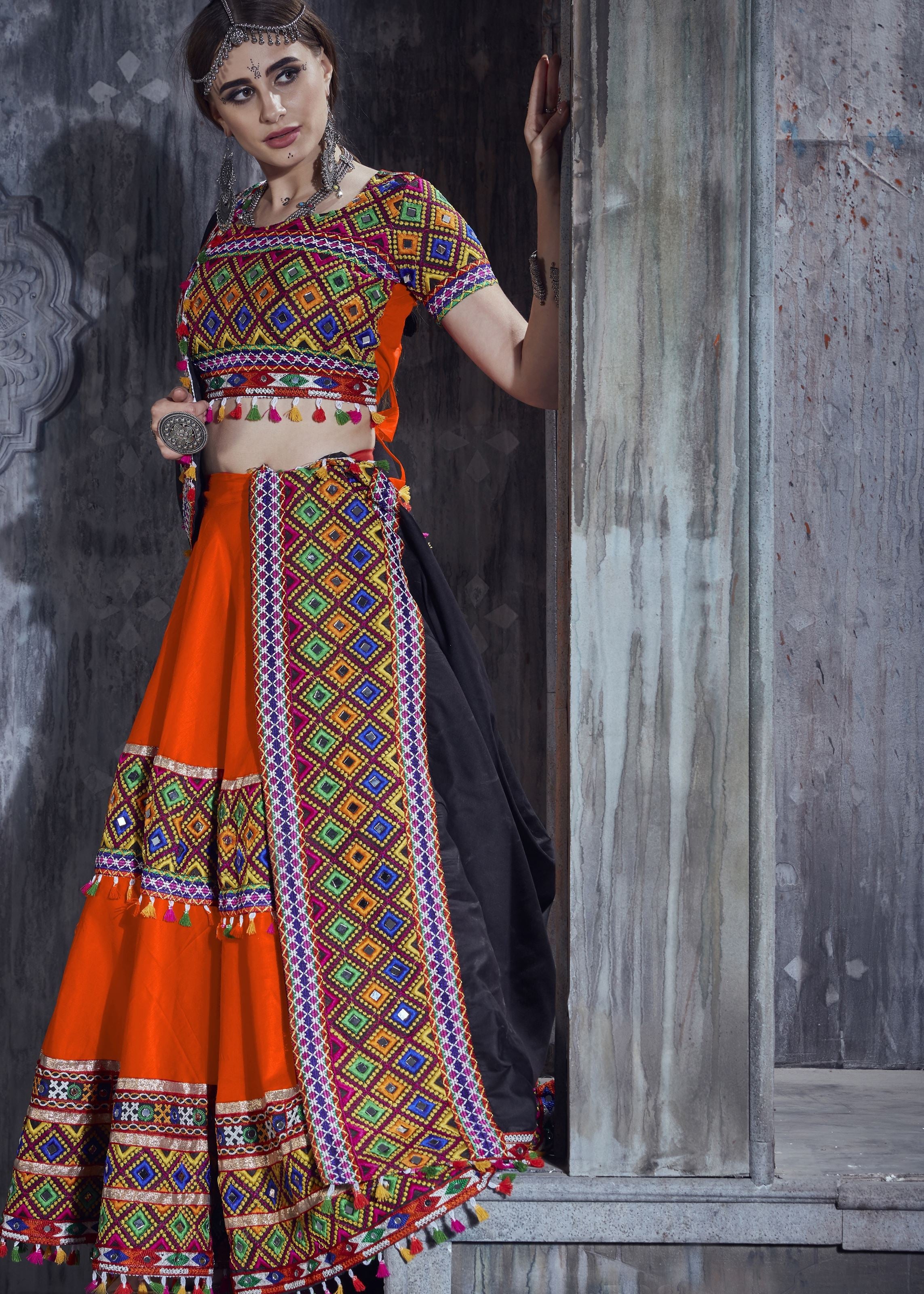 Orange And Black Navratri Chaniya Choli With Gamthi Lace Work With Mirror Work