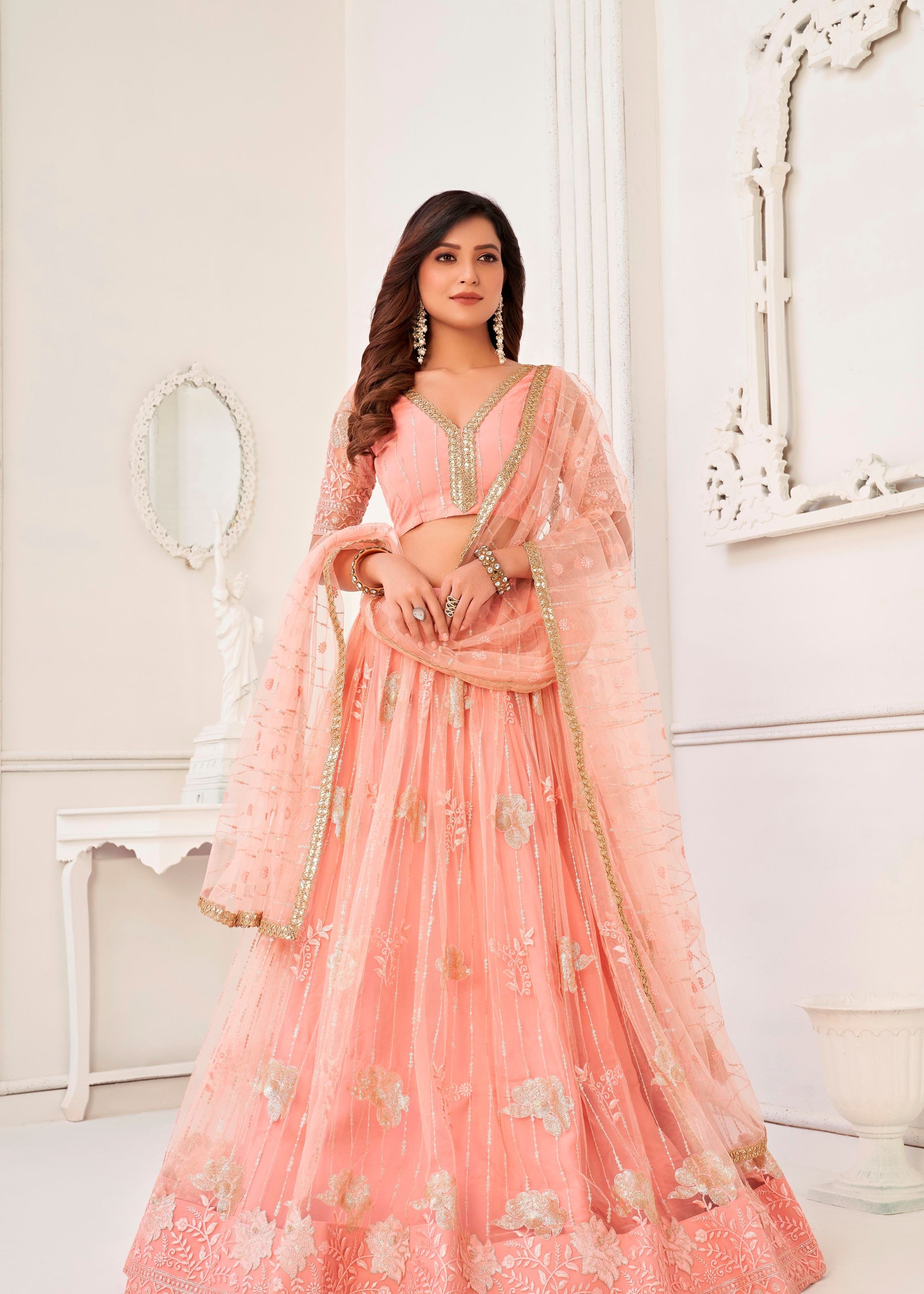 Peach Butterfly Net Lehenga Choli With Tone To Tone Thread Embroidery And Sequins Work