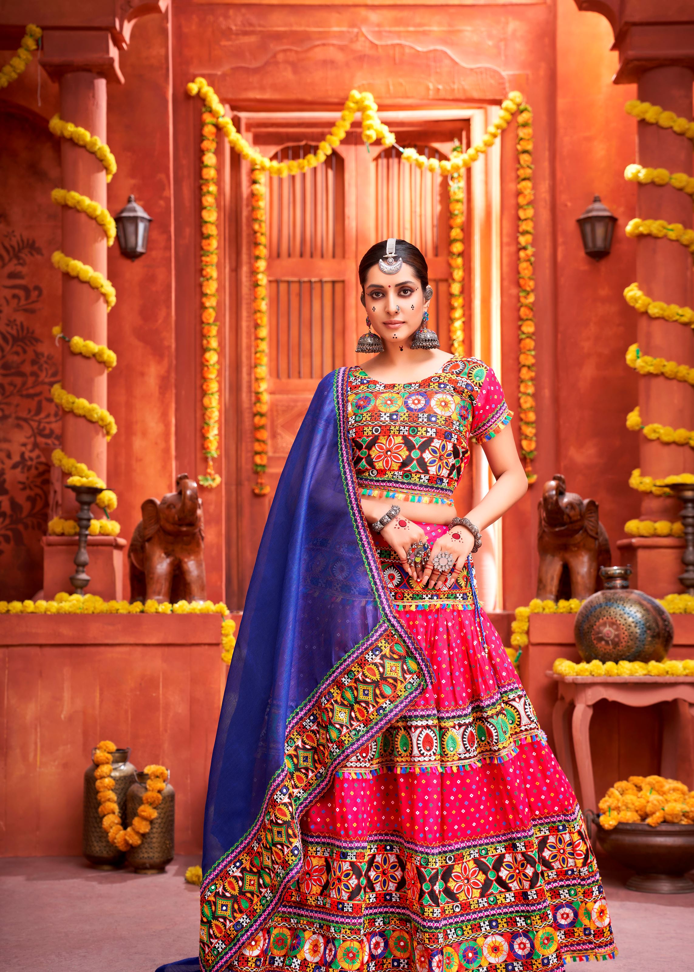 Pink And Royal Blue Navratri Chaniya Choli With Bandej Print With Gamthi Work And Real Mirror Work