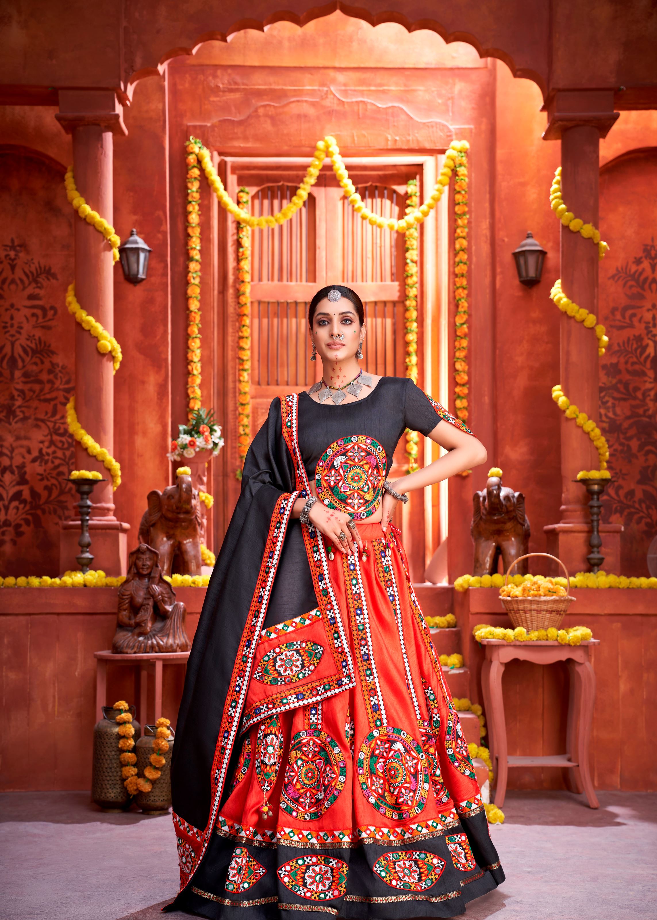 Red And Black Navratri Chaniya Choli With Gamthi Work Butta And Lace With Mirror Hand Work