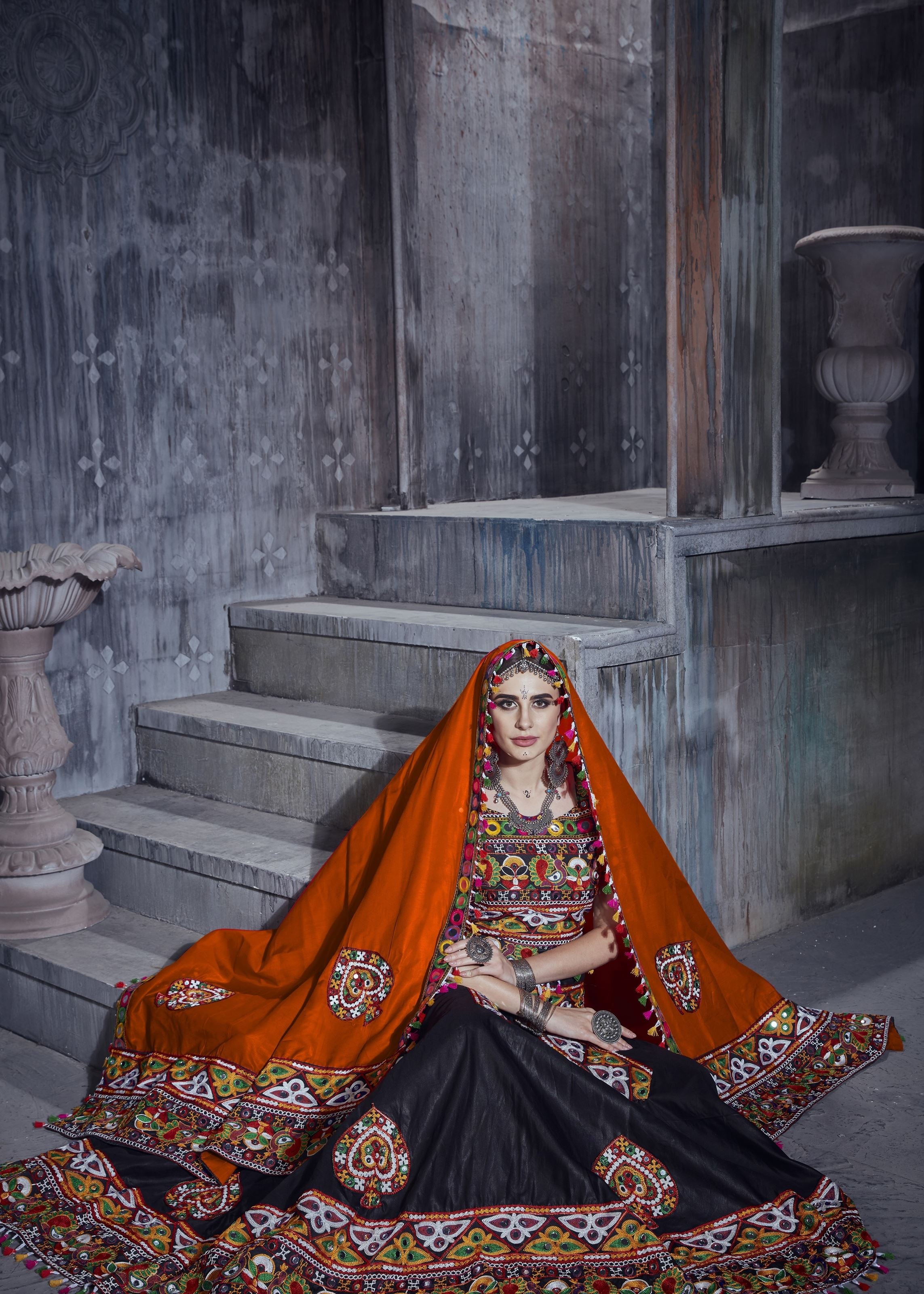 Black And Orange Navratri Chaniya Choli With Gamthi Lace Work With Mirror Work