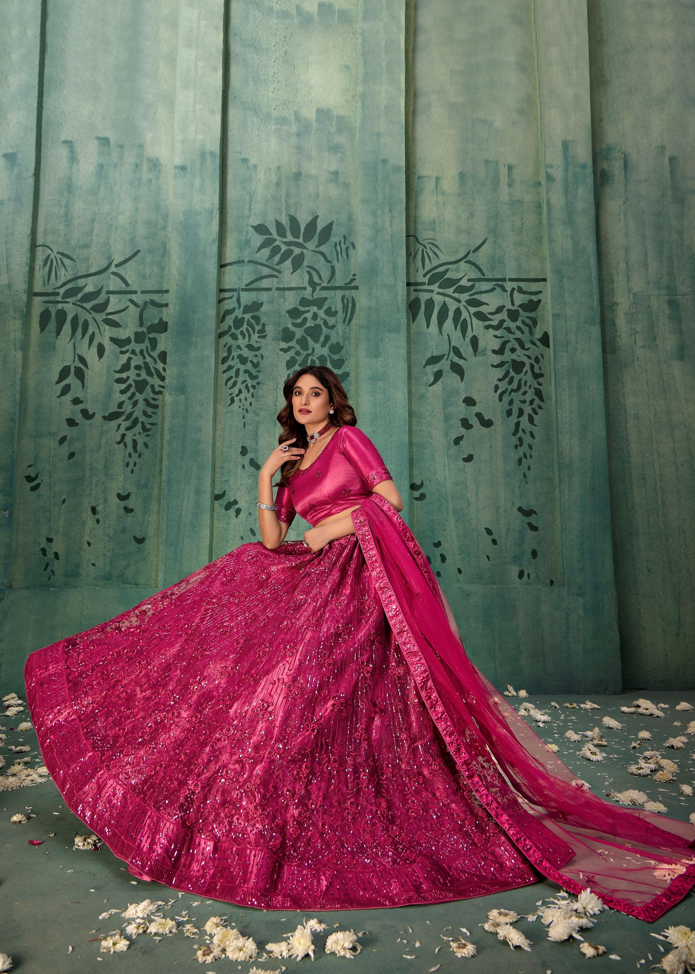 Magenta Pink Net Lehenga with Contemporary Sequin Design
