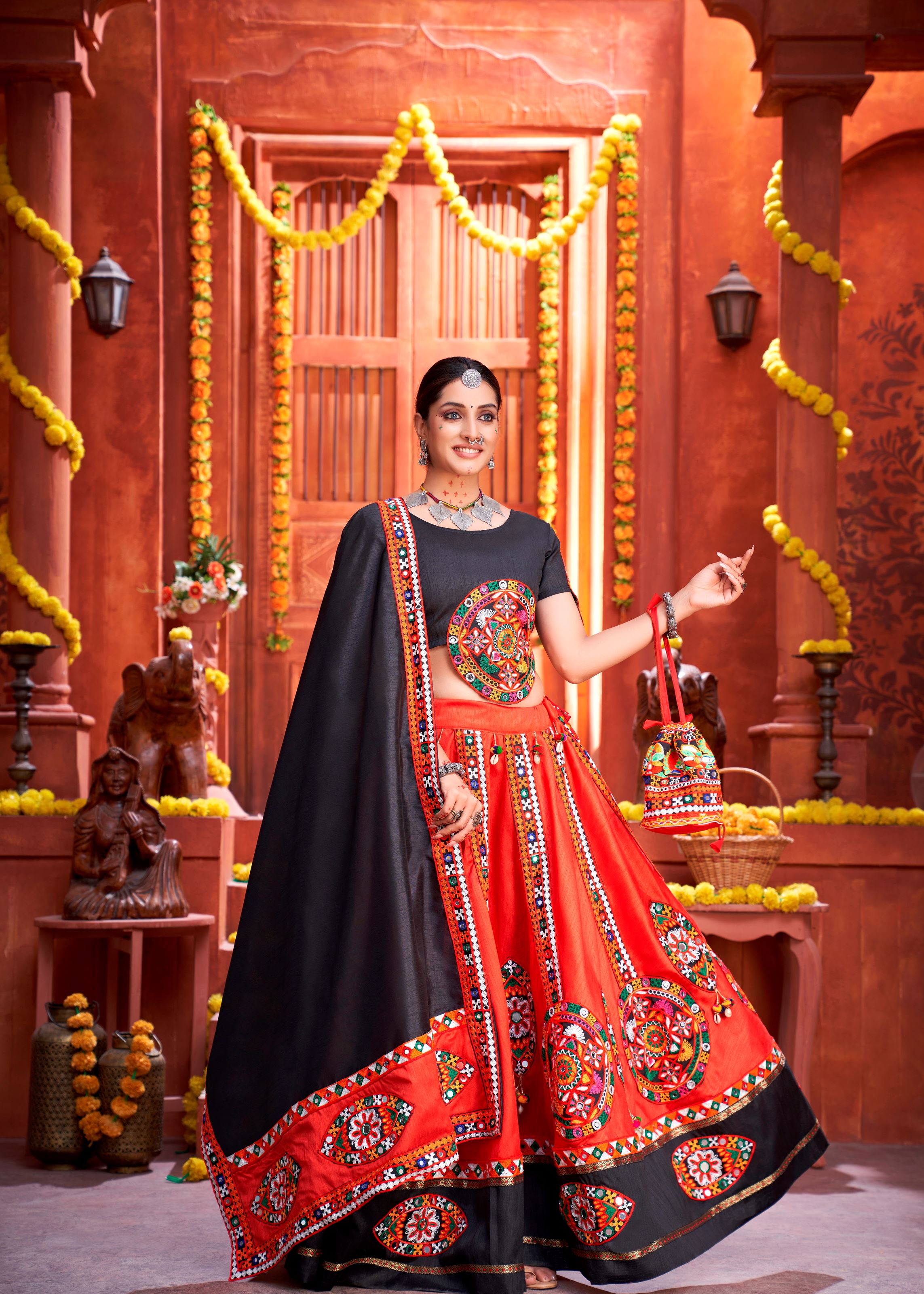 Red And Black Navratri Chaniya Choli With Gamthi Work Butta And Lace With Mirror Hand Work