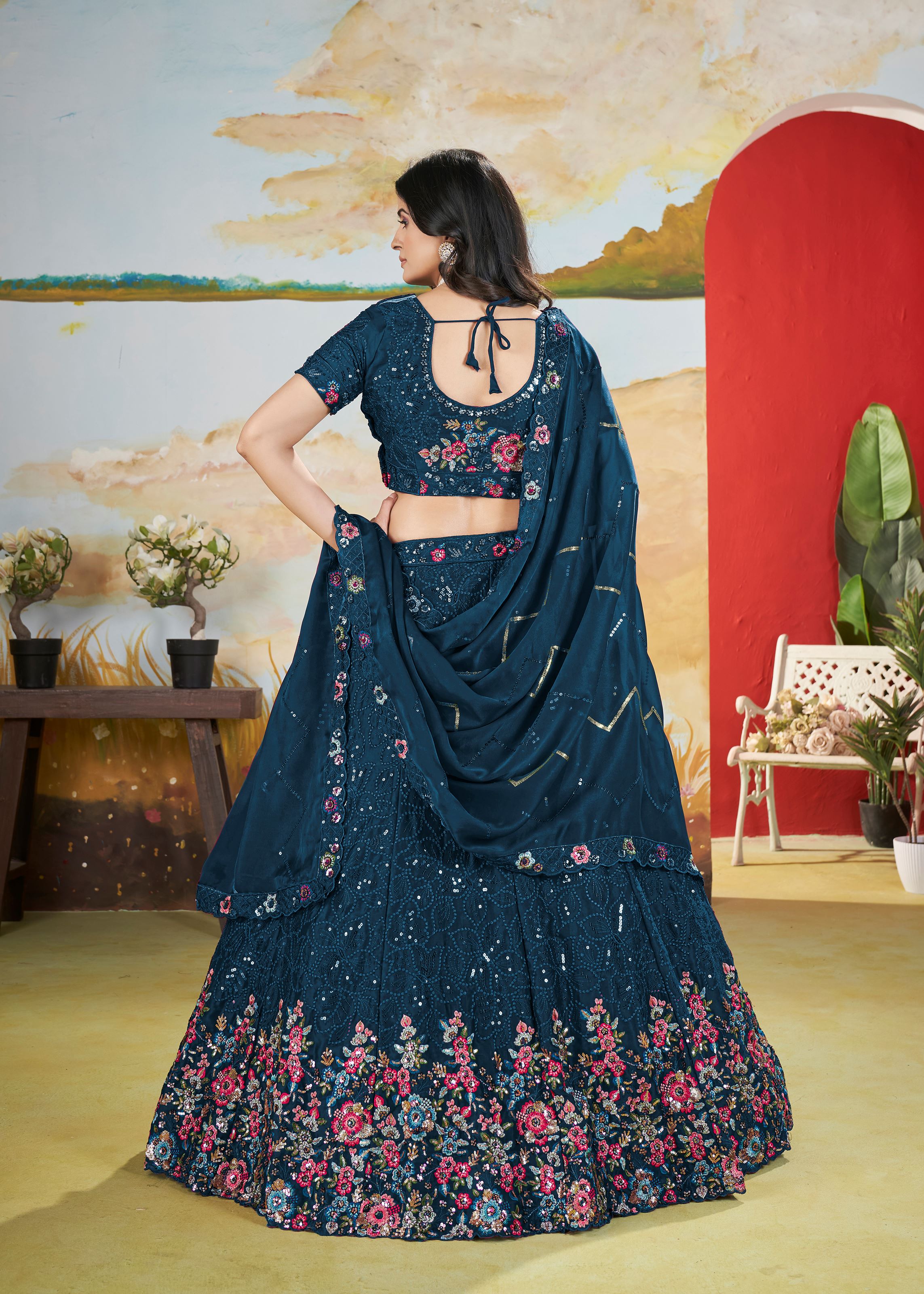 Teal Chinnon Lehenga with Floral Design and Sequin Detailing