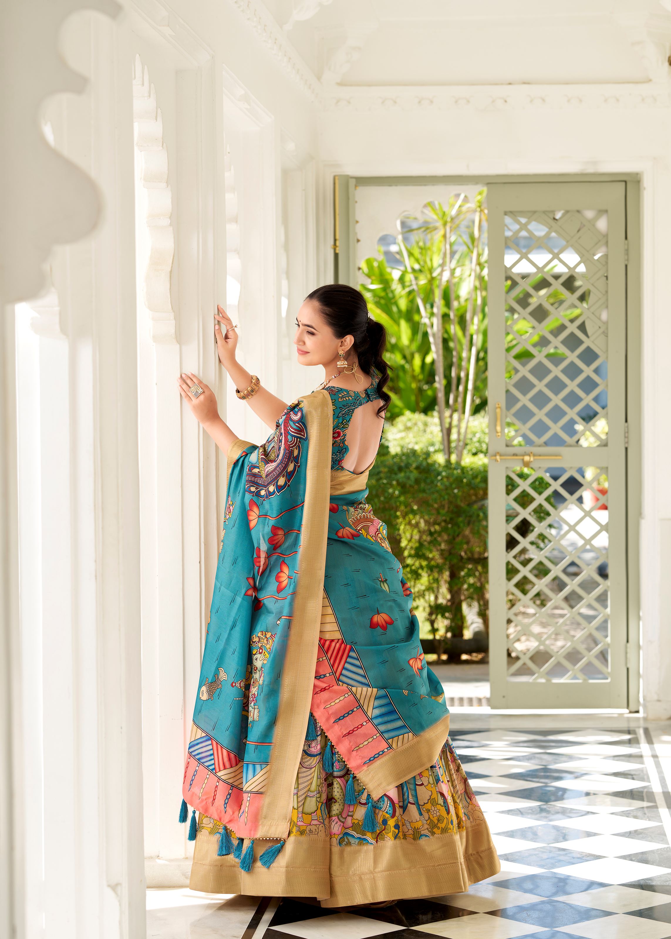 Peach Kalamkari Charm on Luxurious Dola Silk Lehenga with Woven Borders