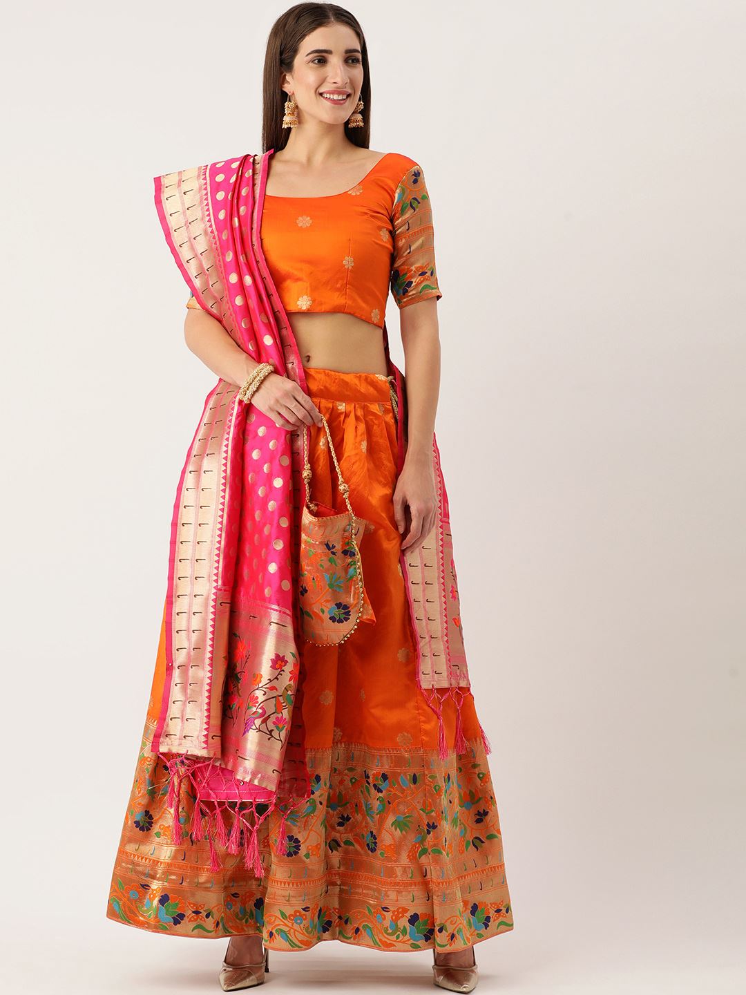 A Royal Hue Of Orange Paithani-Inspired Jacquard Lehenga With Detailed Zari Craftsmanship