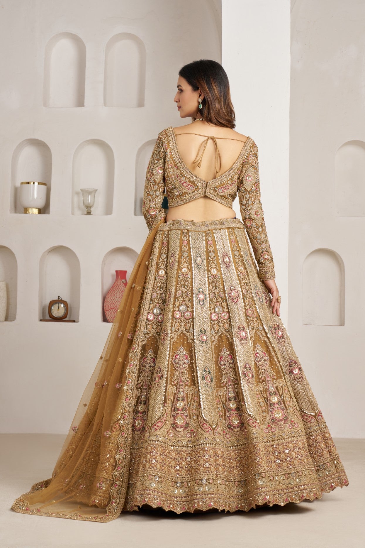 Antique Gold Net Royal Bridal Lehenga Choli with Designer Embellishments