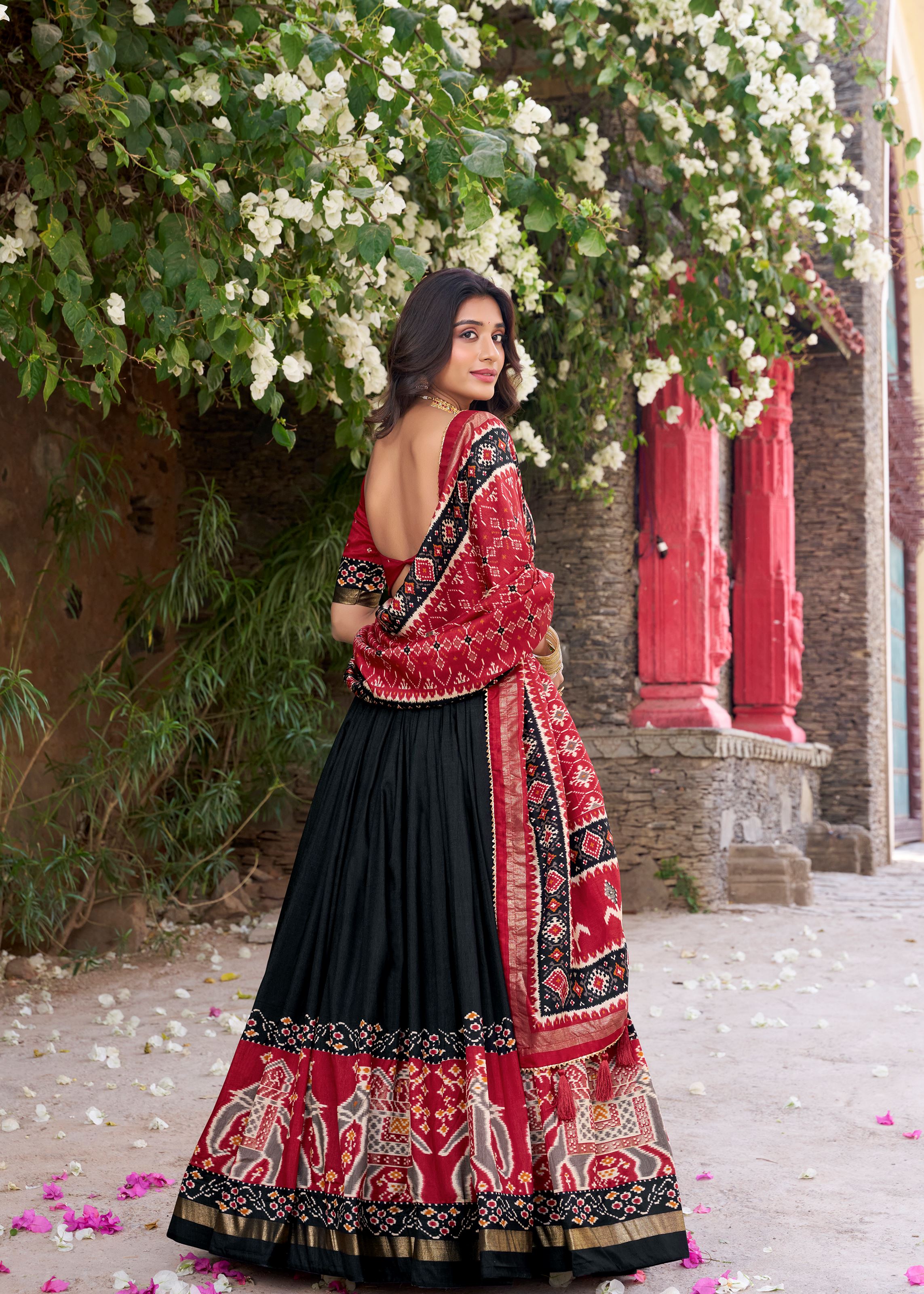 Black Perfection Patola Printed Tussar Silk Lehenga with Foil Highlights