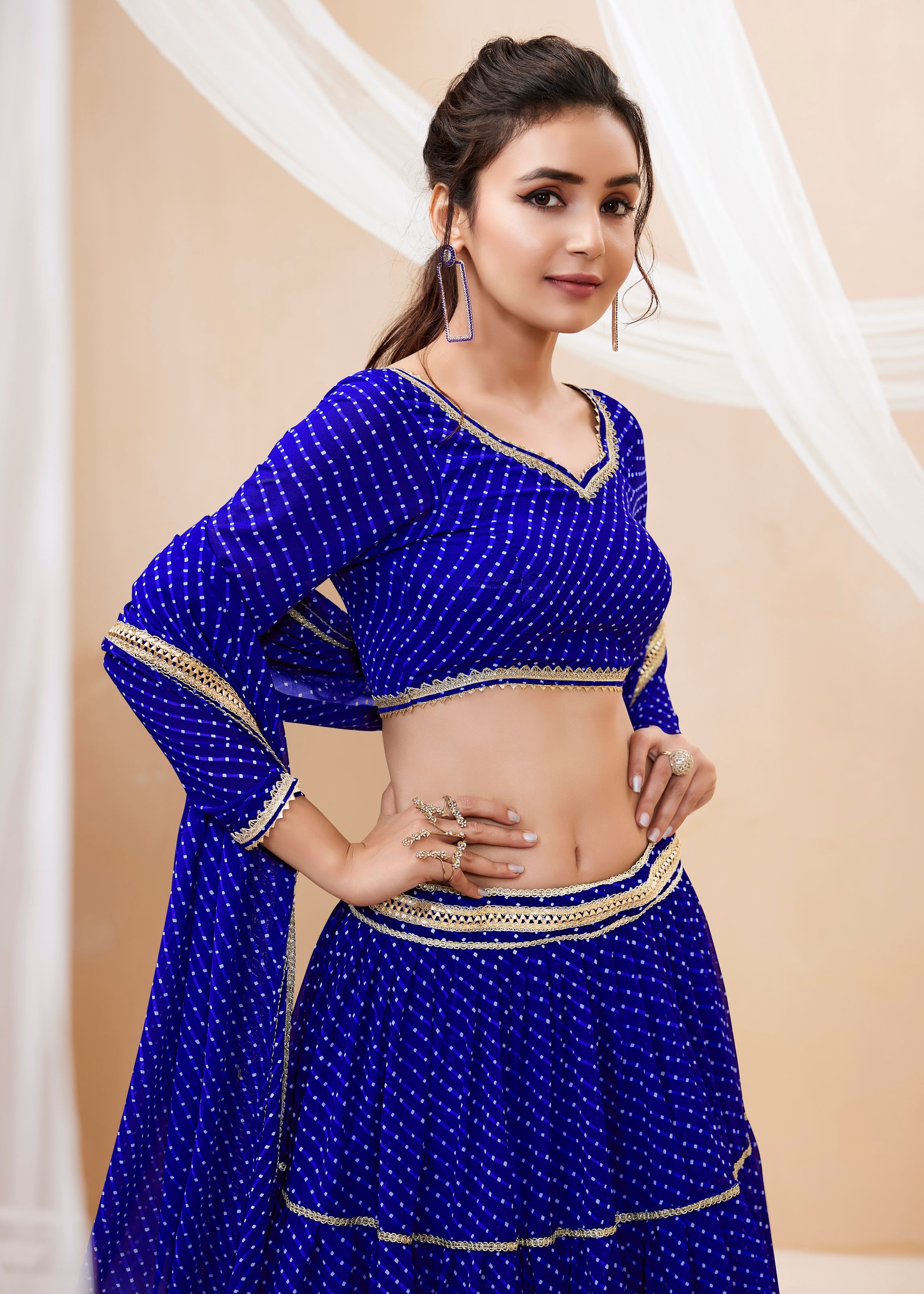 Blue Georgette Lehenga Choli With Georgette Leheriya Printed with lace all over work