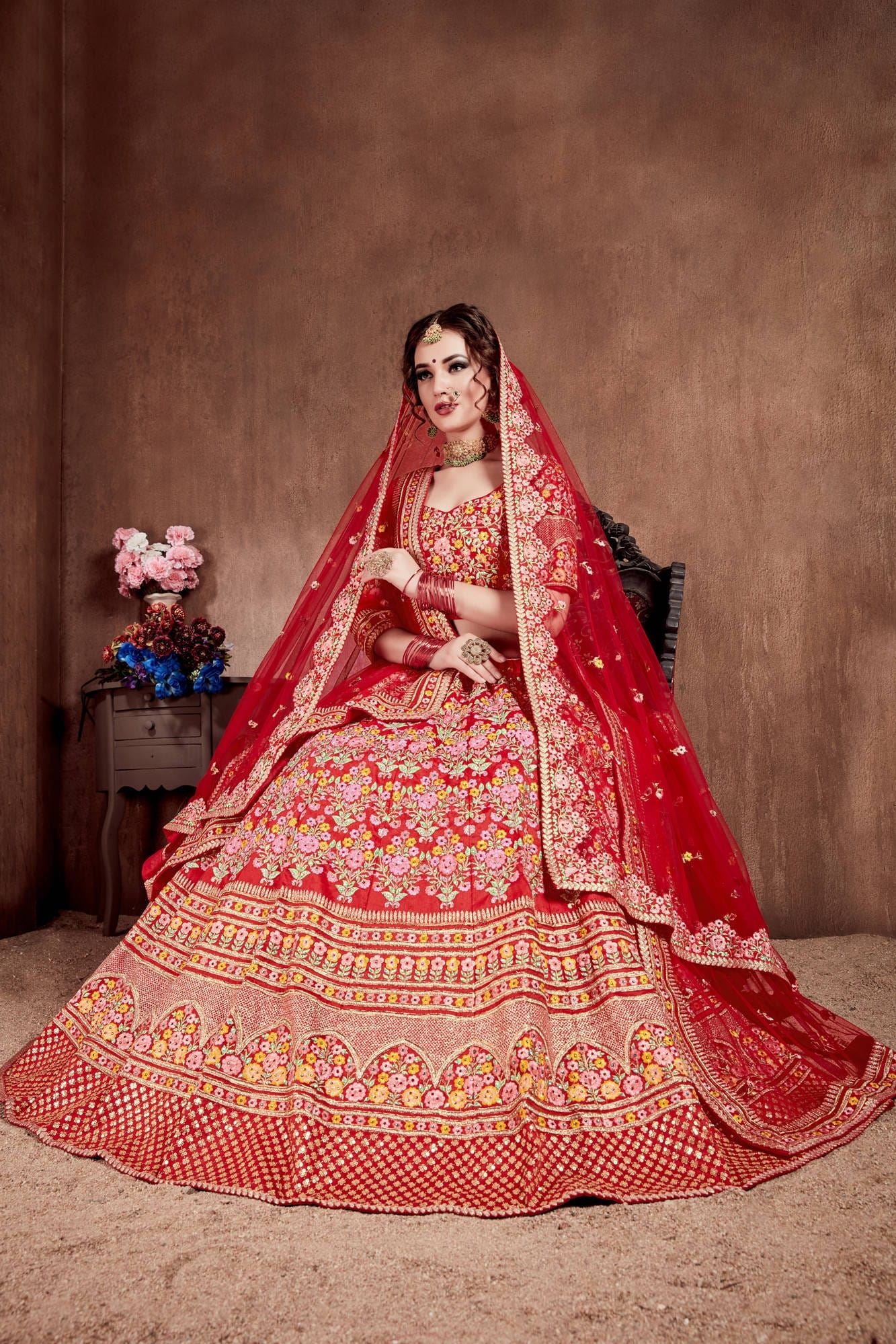 Carmine Red Lehenga Choli With Thread, Dori, Zari, Sequins Embroidery With Stone Work