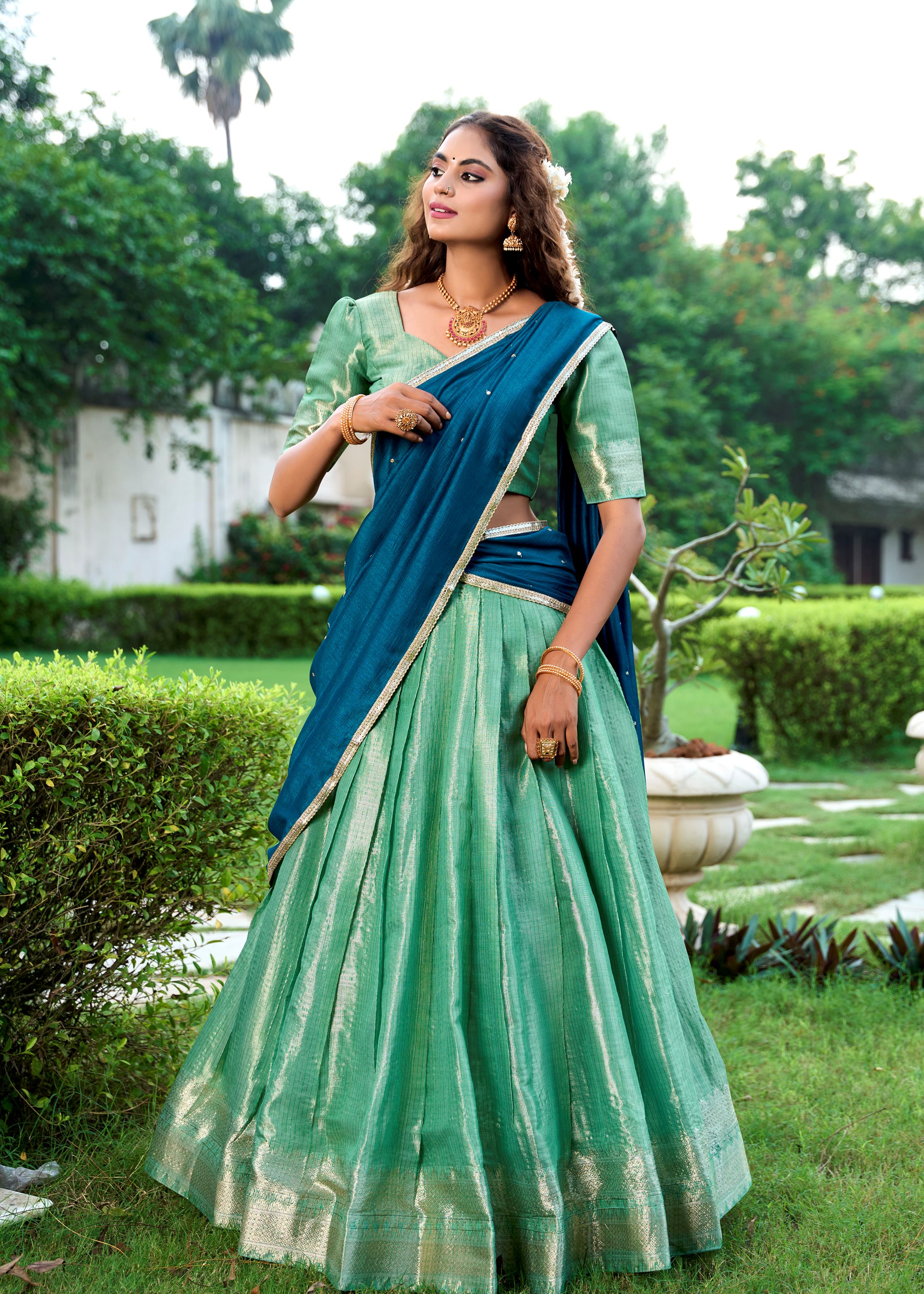Classic Pista Elegance With A Touch Of Tradition Kanchipuram Lehenga