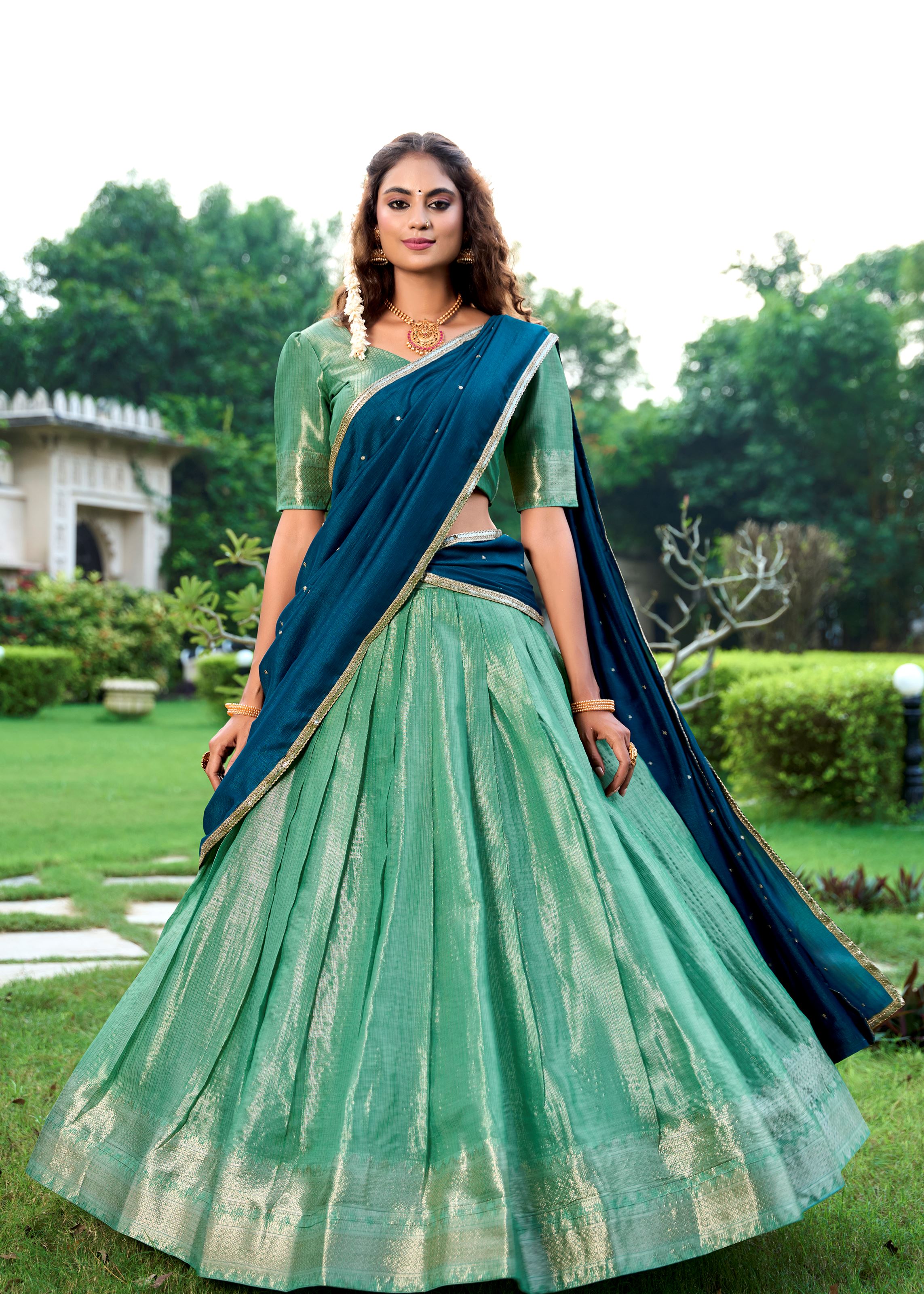 Classic Pista Elegance With A Touch Of Tradition Kanchipuram Lehenga