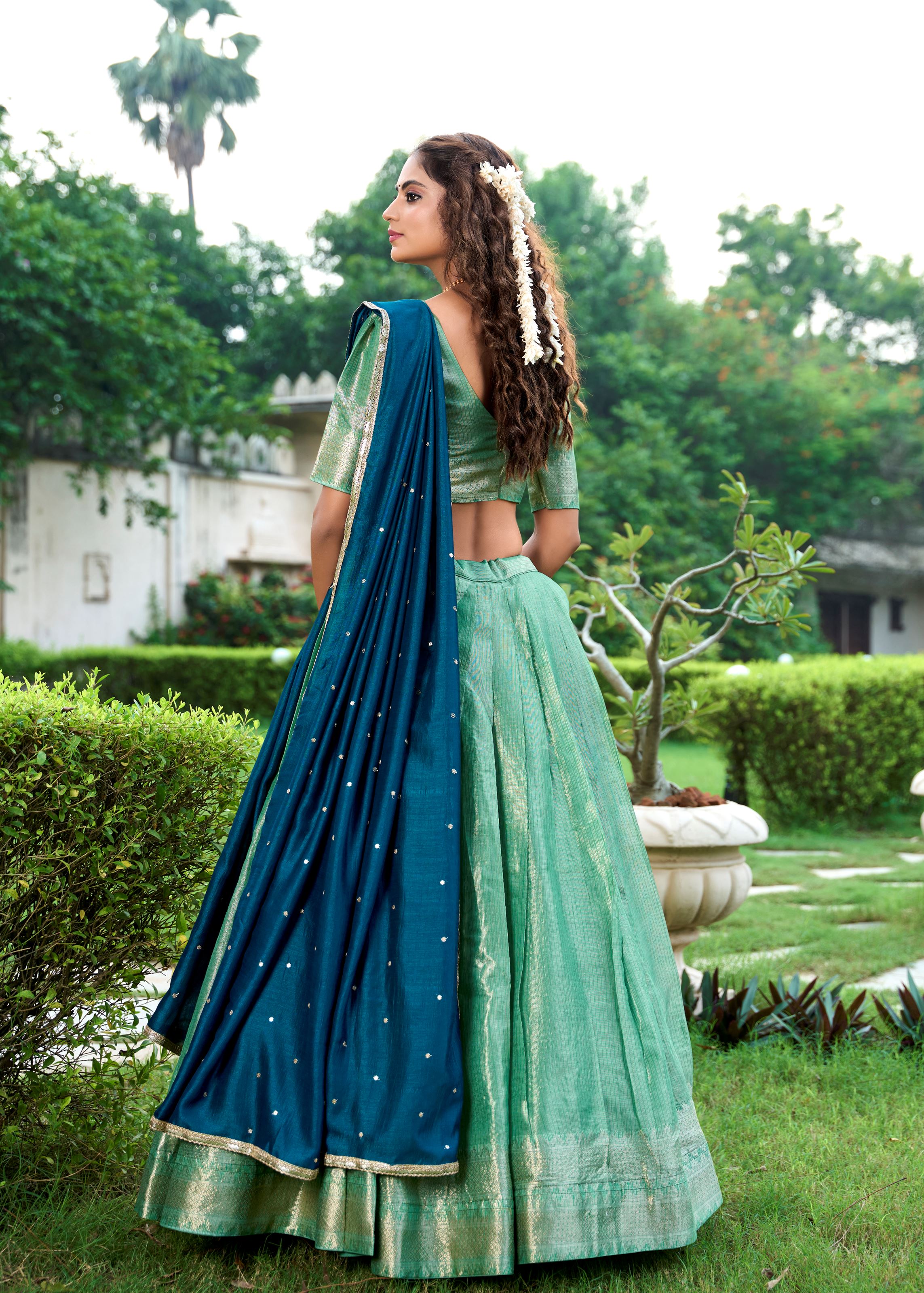Classic Pista Elegance With A Touch Of Tradition Kanchipuram Lehenga