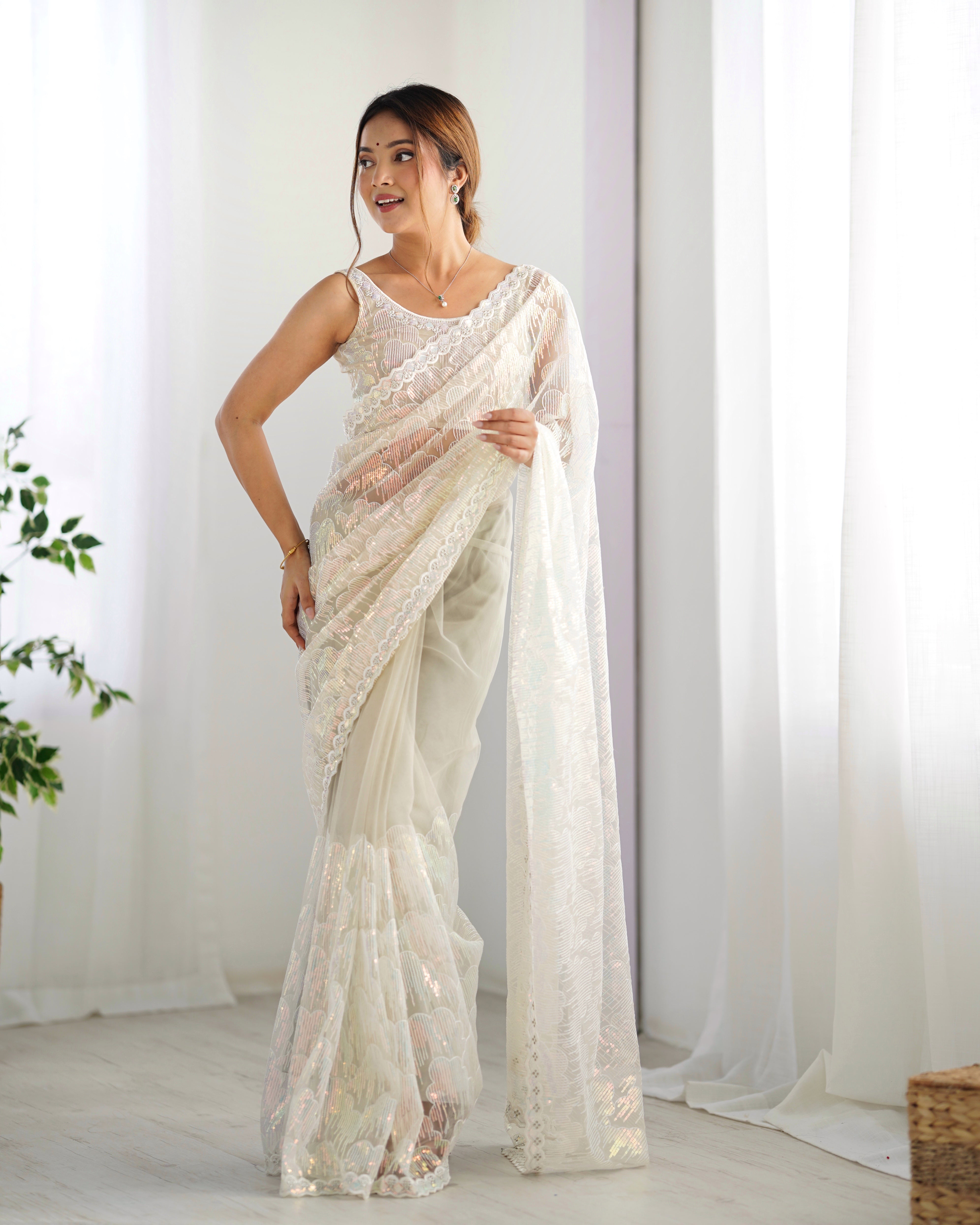 Cream Mono Net Beautiful Bollywood Saree With Designer Sequins Work