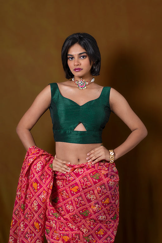 Dark Green Sleeveless Blouse with A Triangle Cut Out At The Bottom and Back Tie-Up with Hooks Closure