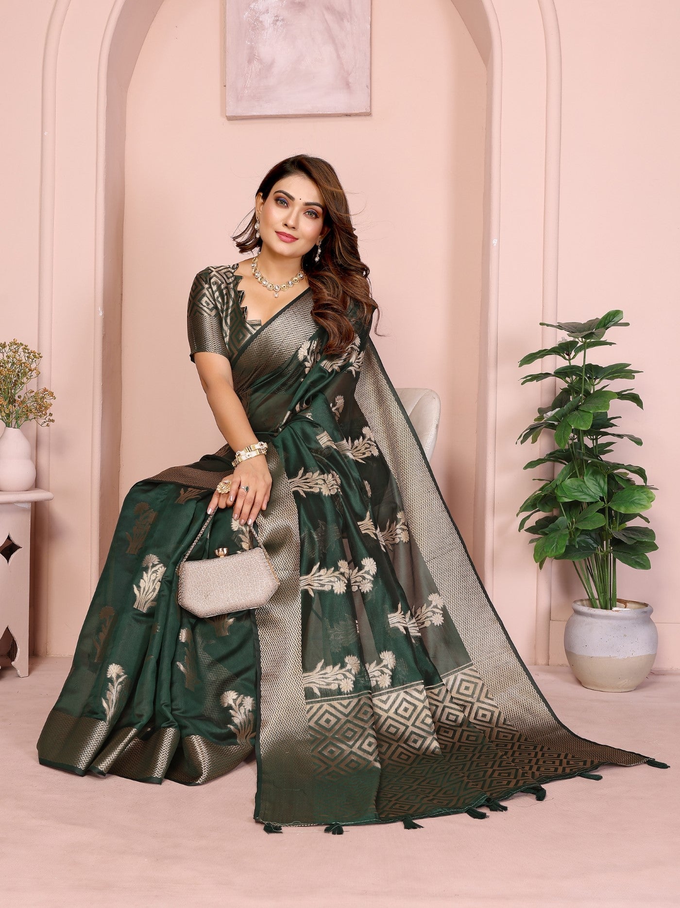 Dark Green Soft Organza Silk Saree With Elegant Weaving