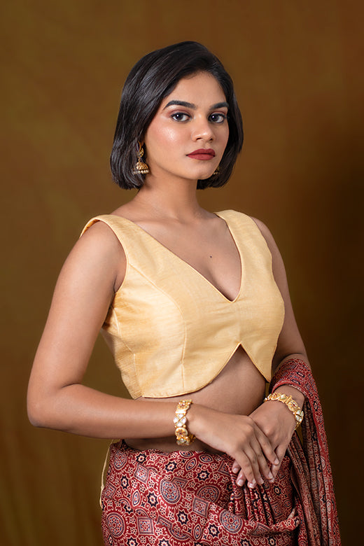 Dusty Gold Sleeveless Blouse in Art Silk with A V-Neckline