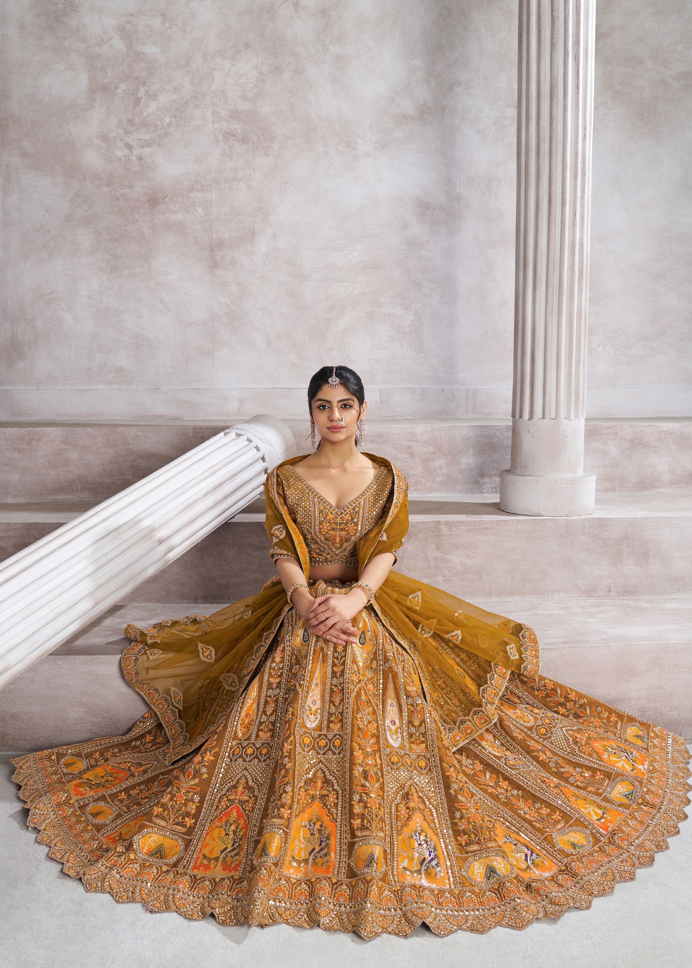 Earthy Mustard Color Bridal Lehenga With Patch And Aari Work