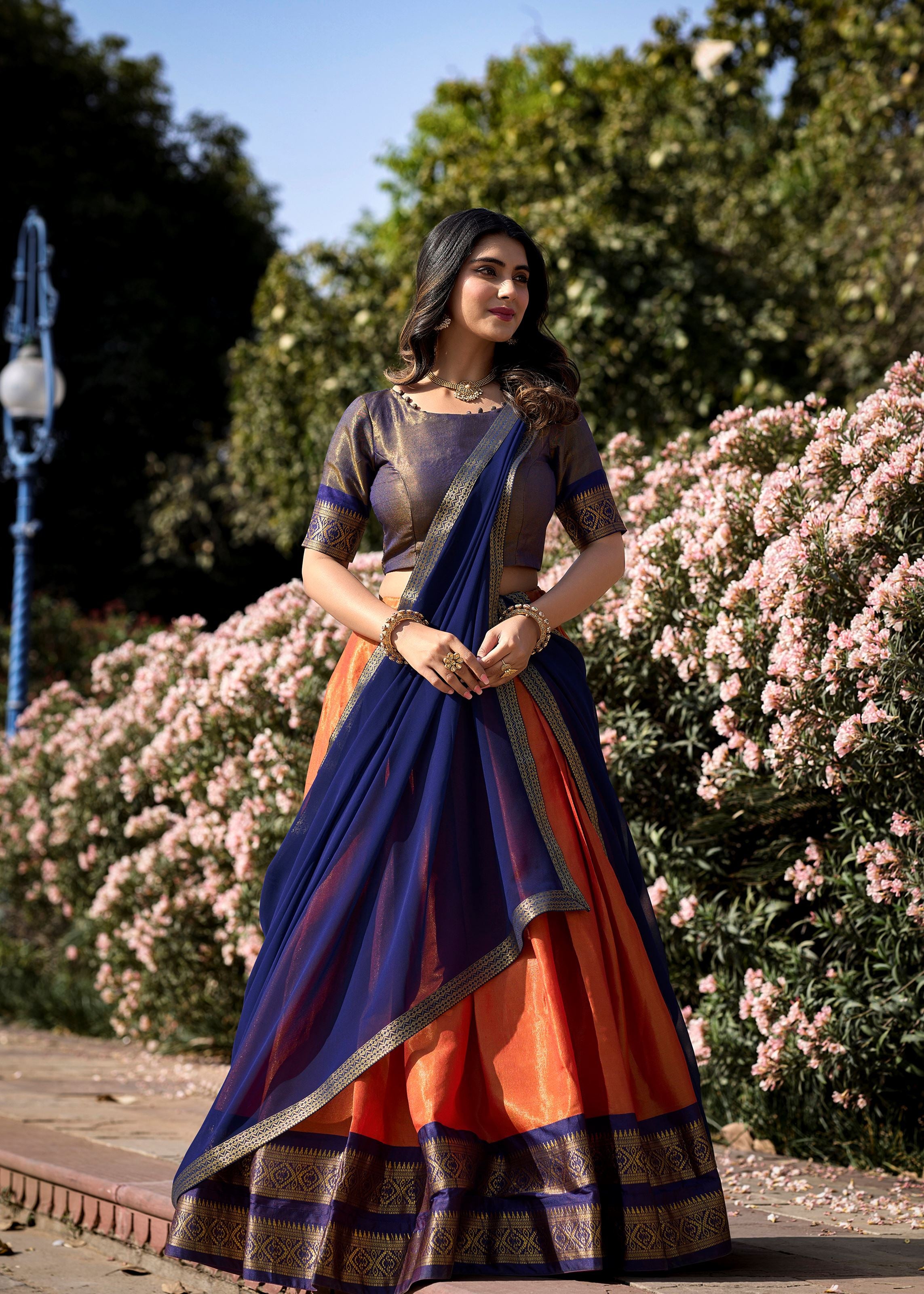 Golden Glow Zari Woven Orange Kanchipuram Lehenga for Festive Grandeur