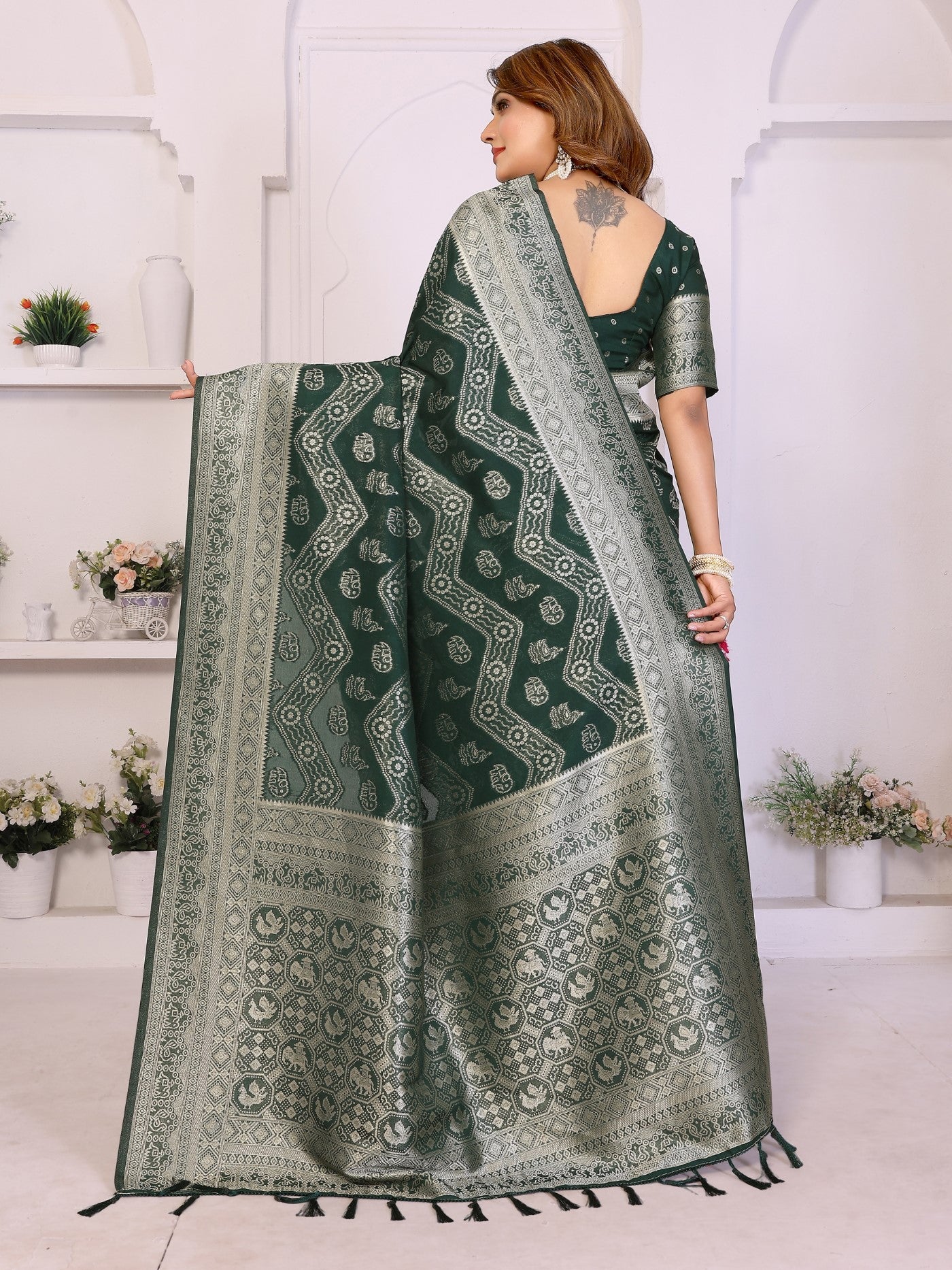Green Georgette Silk Saree With Leheriya And Elegant Zari Weaving