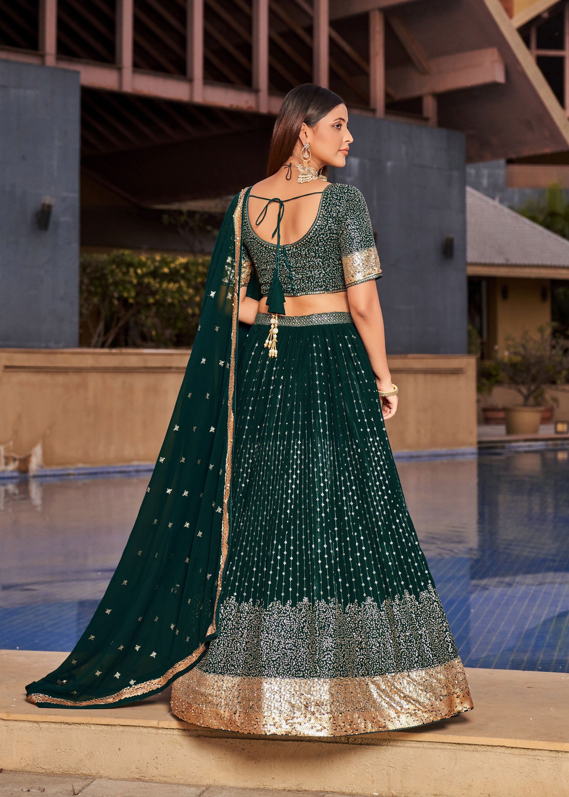Green Lehenga Choli With Multiple Sequins And Thread Embroidery Work