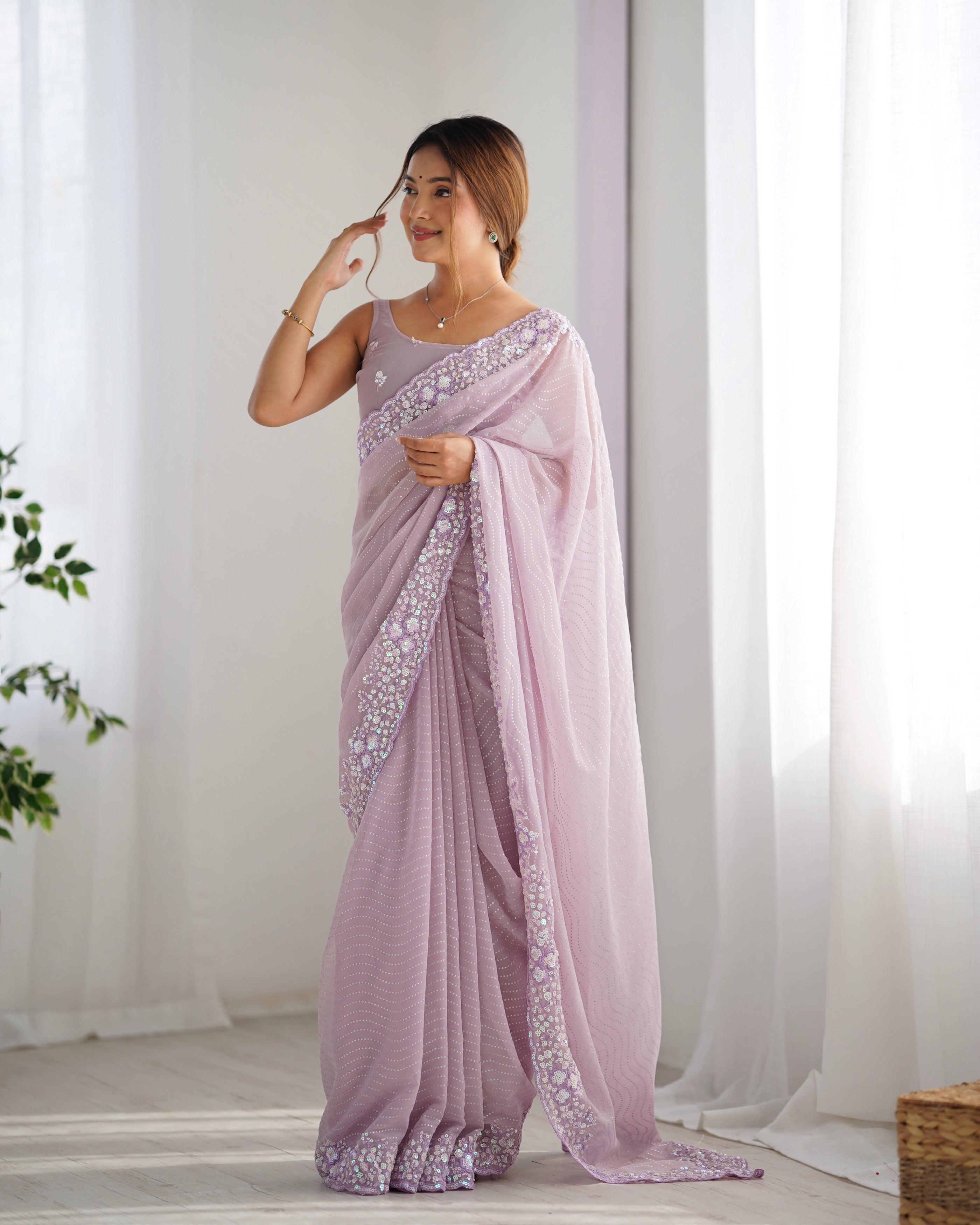 Lavender Georgette Beautiful Partywear Embroidered Saree