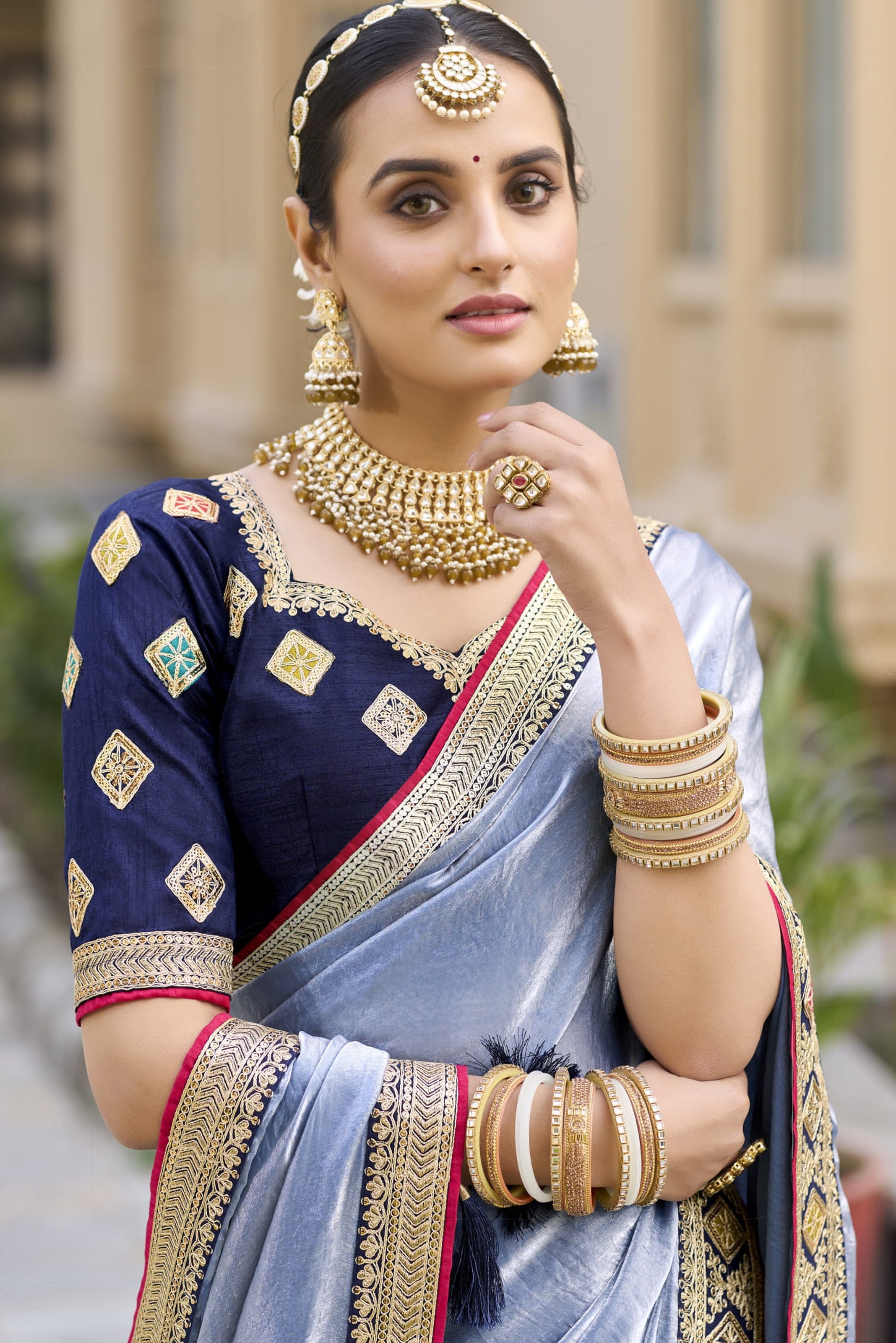 Light Blue Georgette Plain Saree With Embroidered Lace Border