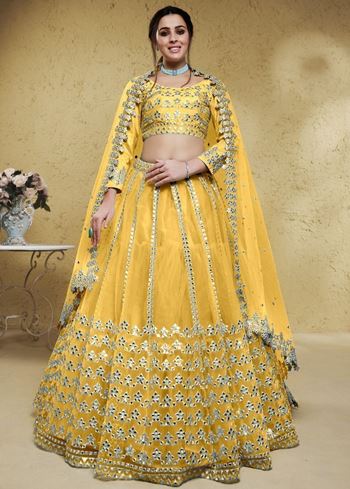 Magnetic Yellow Foil Work Net Haldi Wear Lehenga Choli With Dupatta