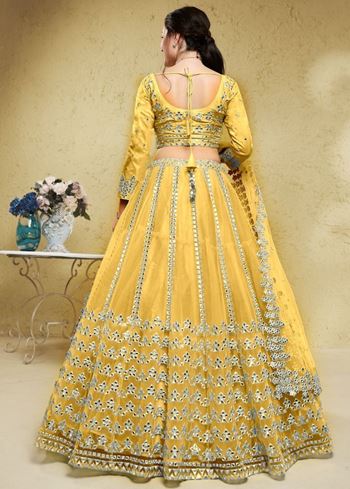 Magnetic Yellow Foil Work Net Haldi Wear Lehenga Choli With Dupatta
