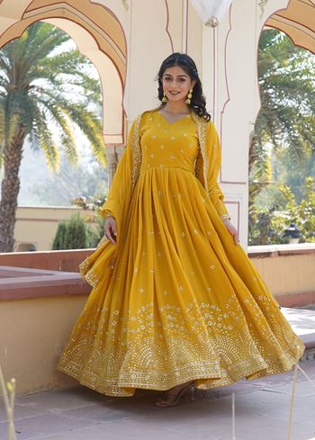Mustard Faux Georgette Suit With Print