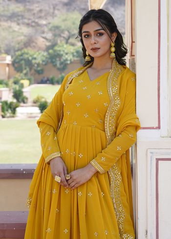 Mustard Faux Georgette Suit With Print