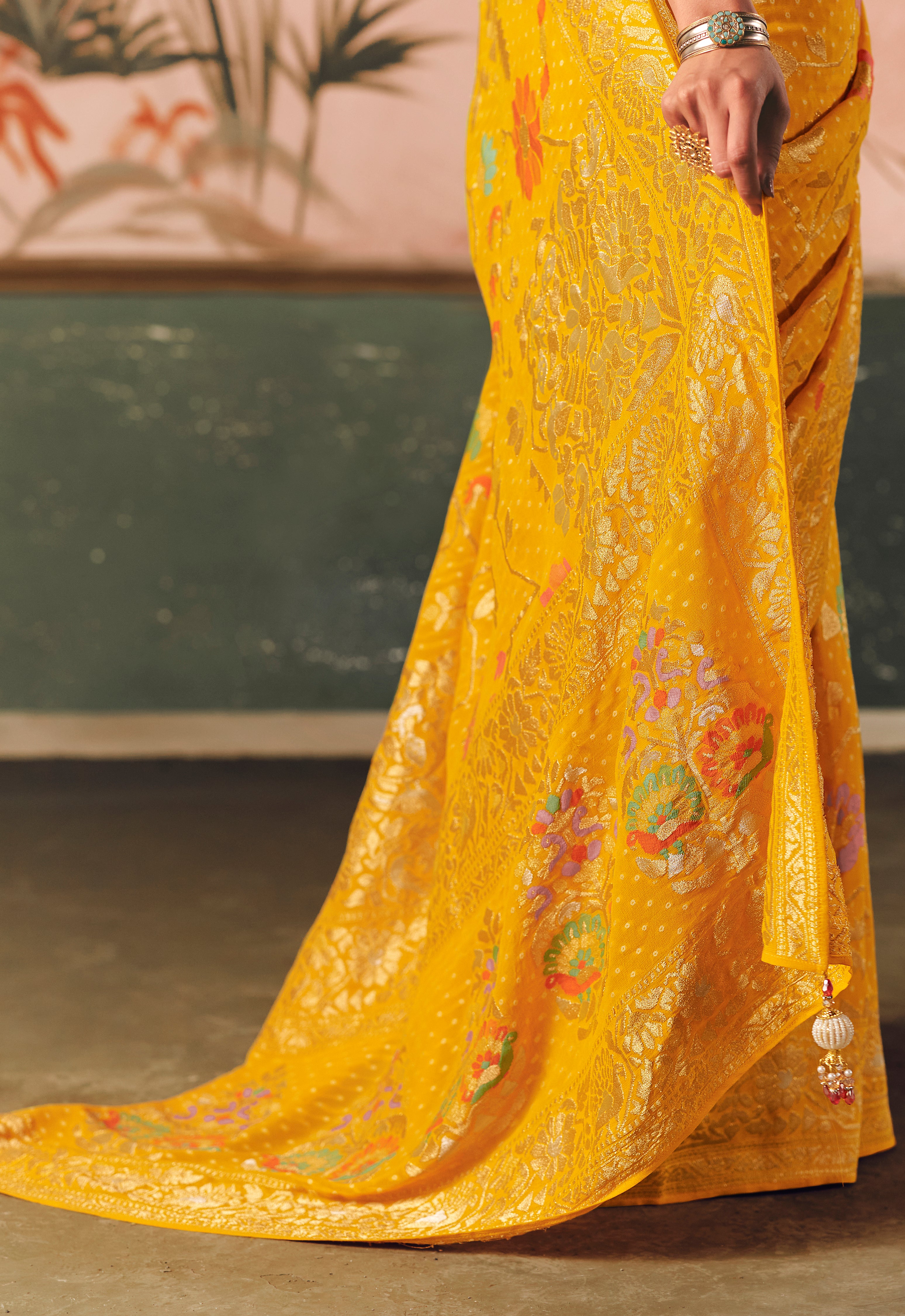 Mustard Saree With Designer Bandhej Weaving Work With Beutifull Tassles Attached