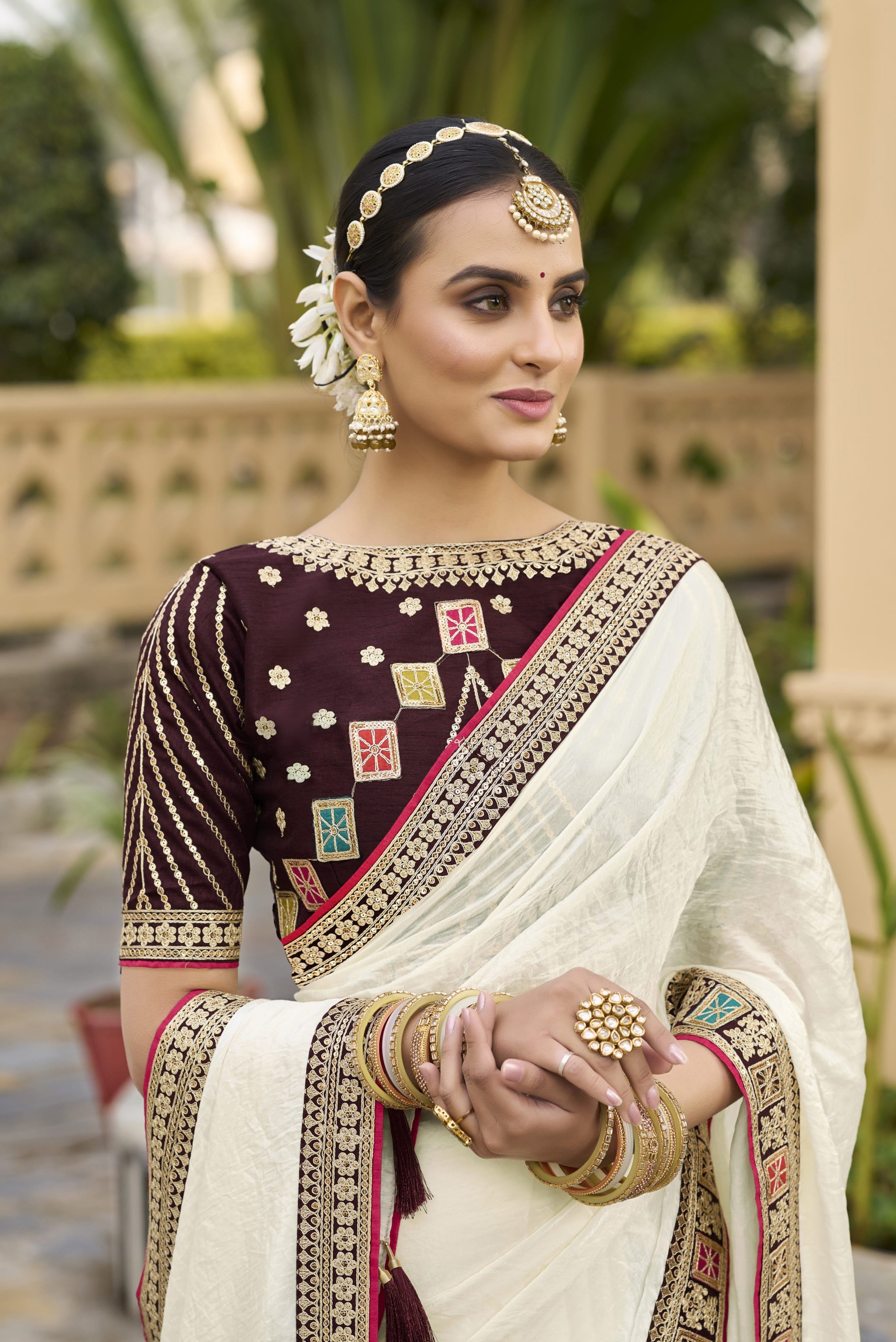Off White Georgette Plain Saree With Embroidered Lace Border