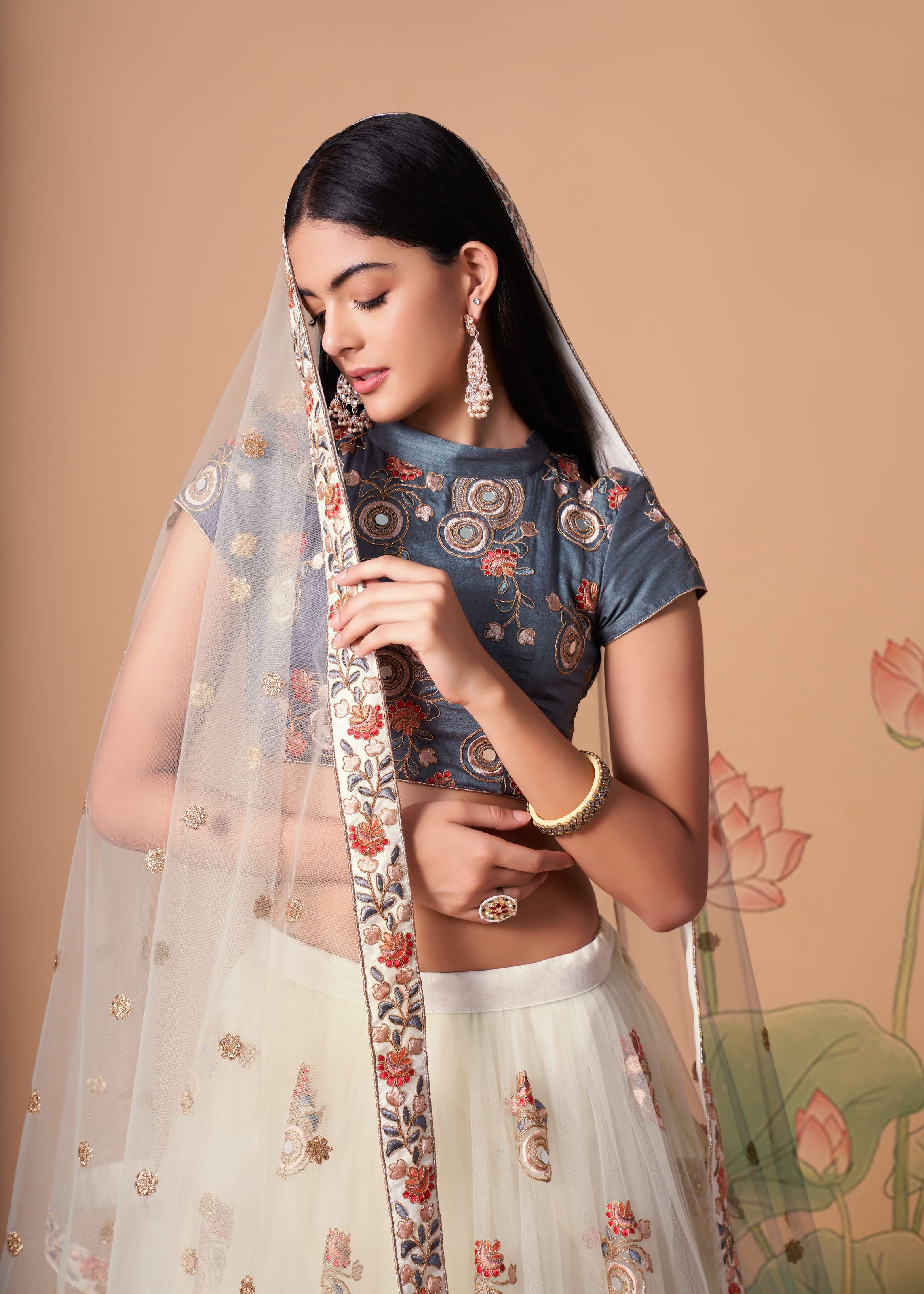 Off White Lehenga Choli With Thread, Zari, Dori And Sequins Embroidery With Mirror Work