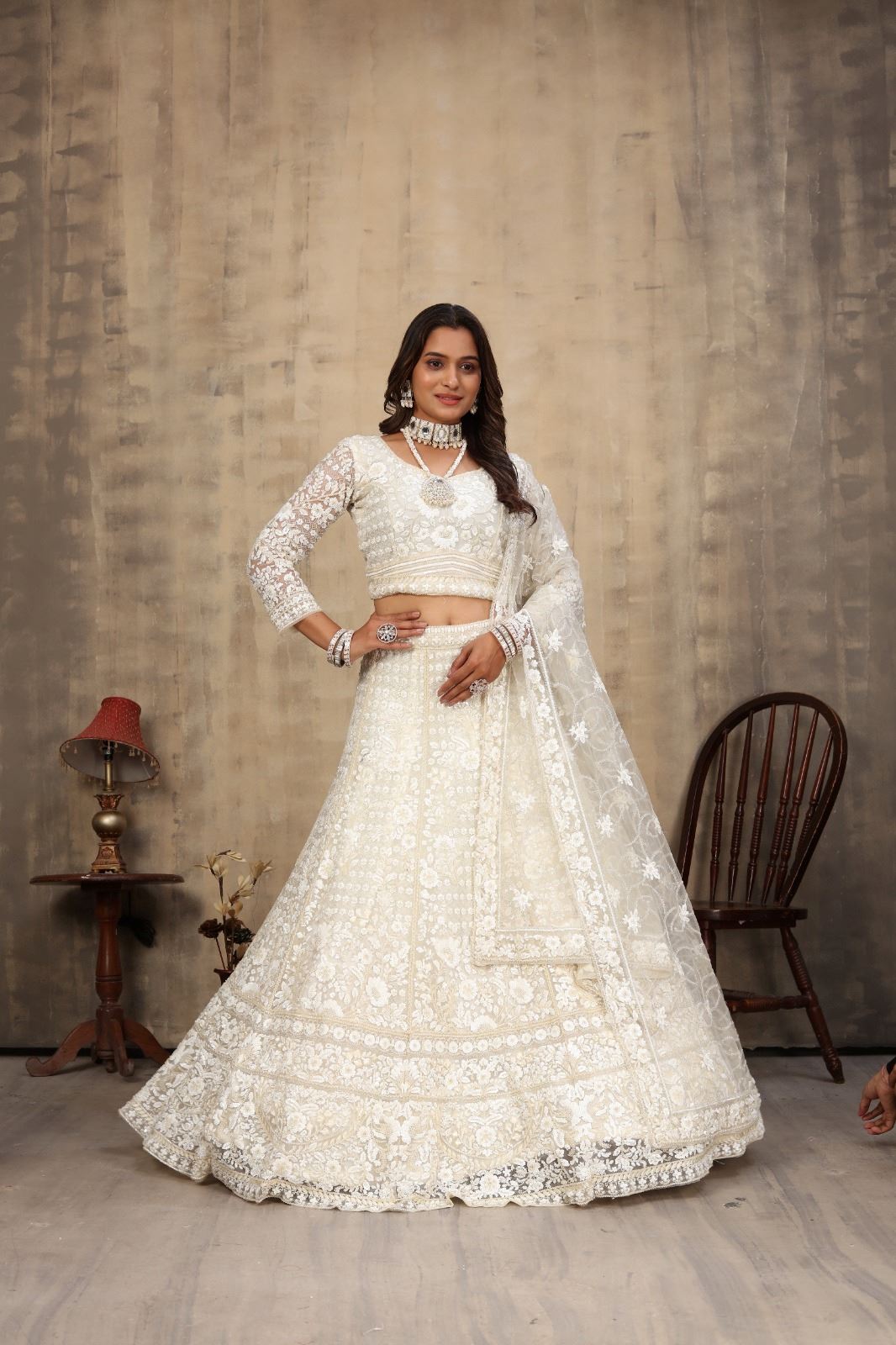 Off White Net Lehenga Choli With Embroidery Work