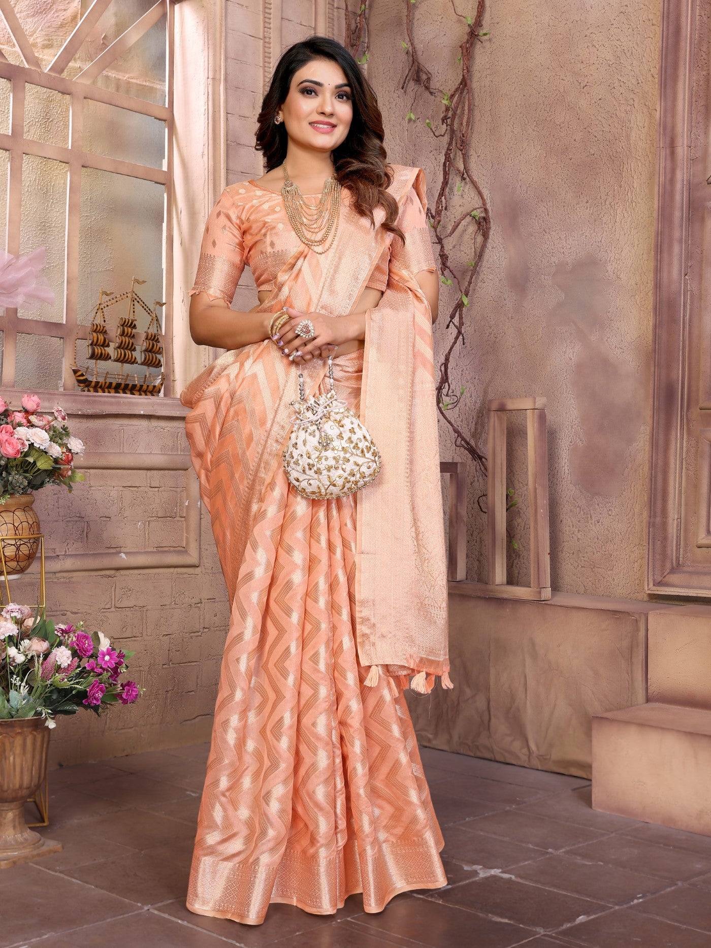 Peach Soft Organza Silk Saree With Elegant Weaving