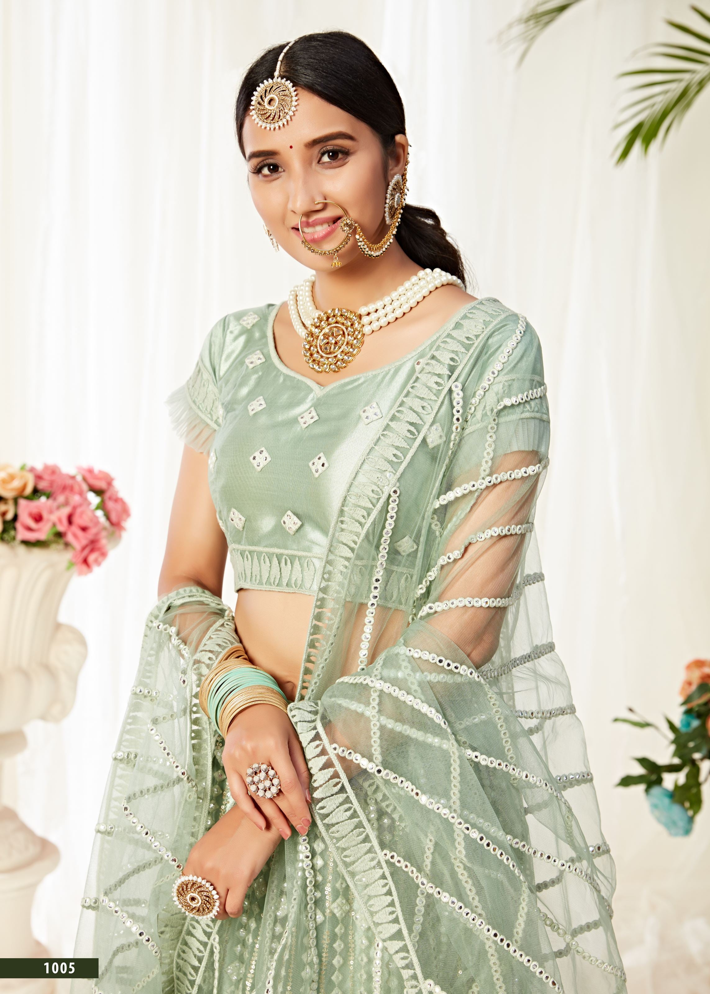 Pista Lehenga Choli With Sequins And Mirror Thread Embroidered Work