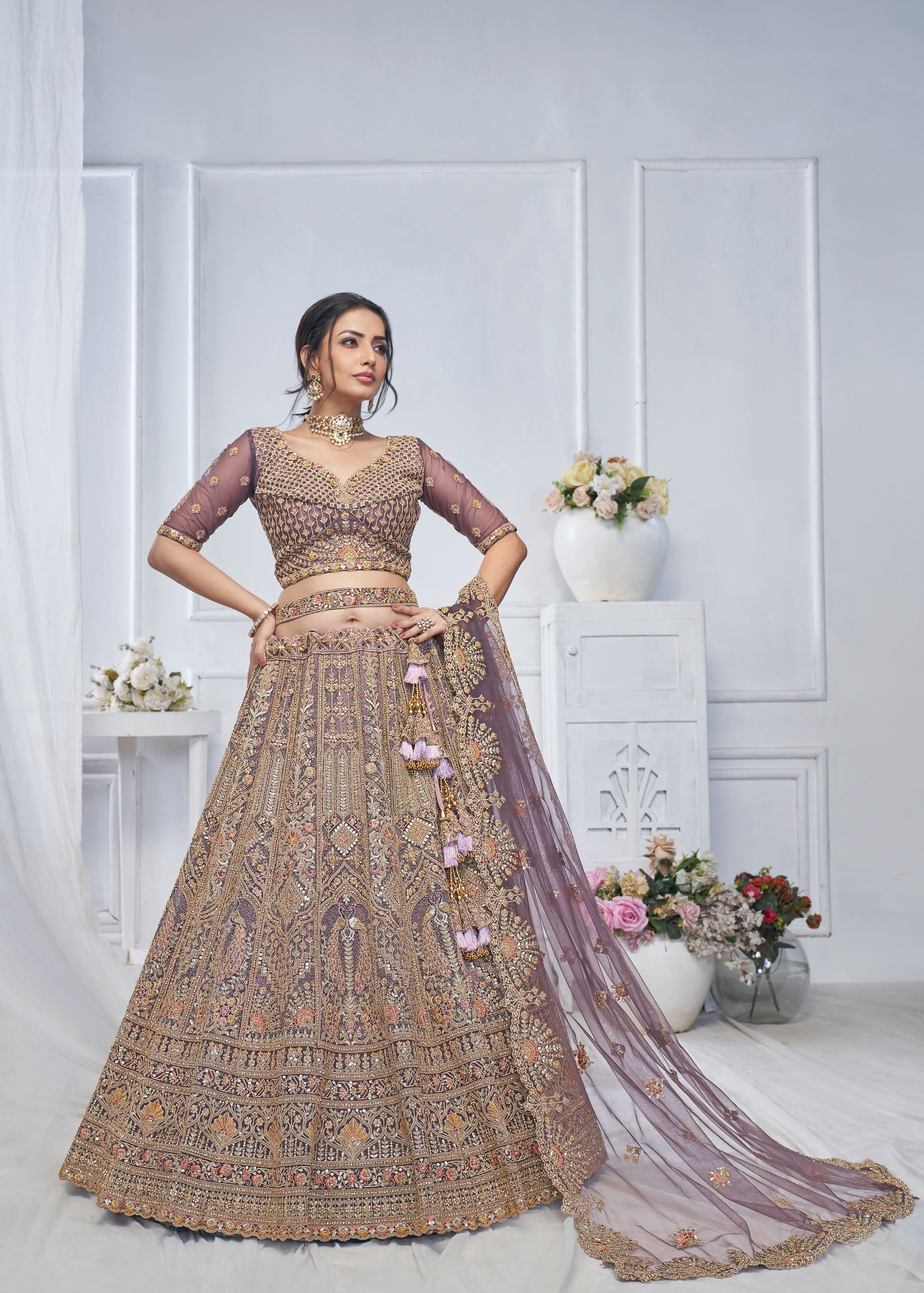 Purple Soft Net Lehenga Choli With Paisley And Peacock Motifs & Heavy Embroidery