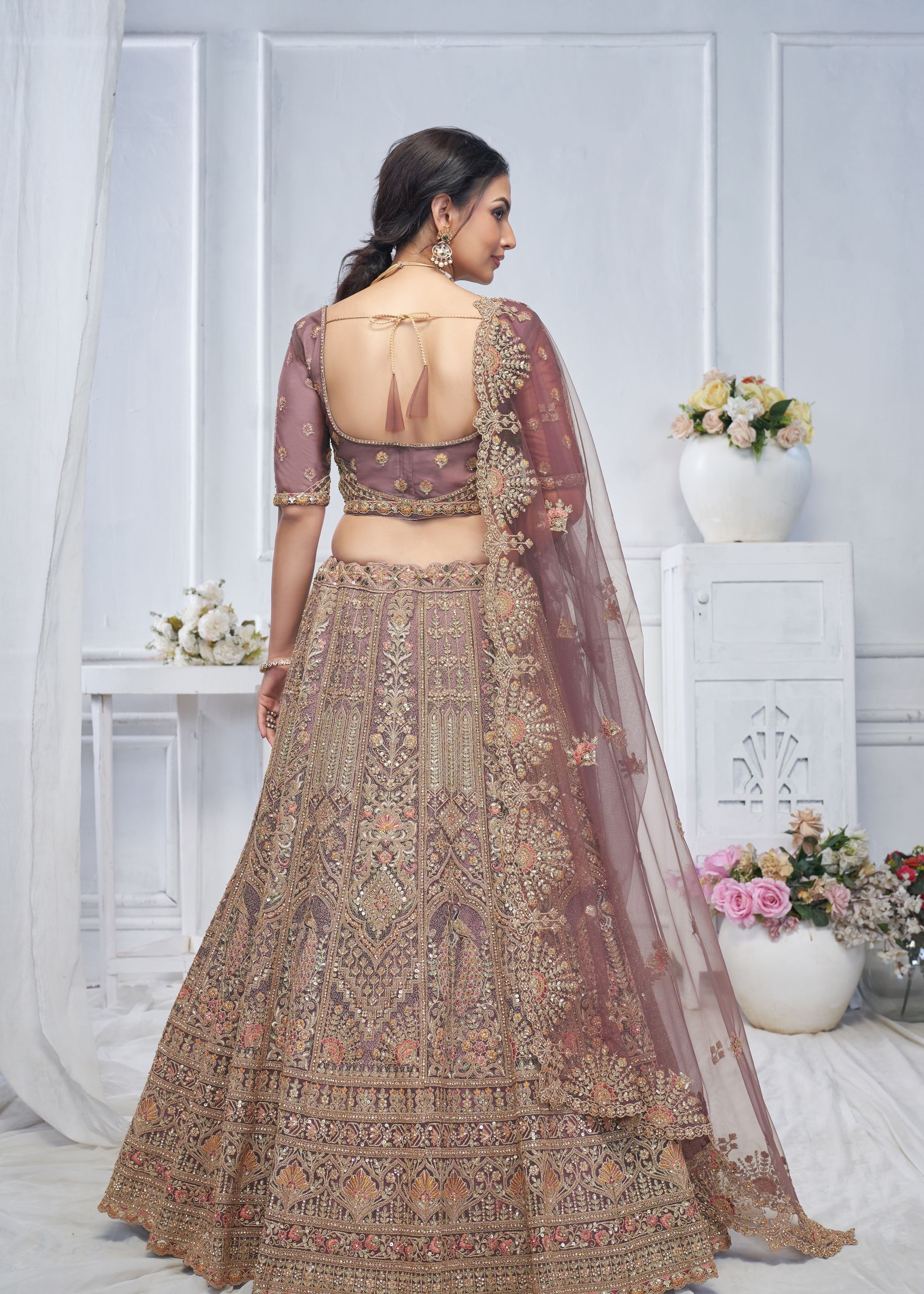 Purple Soft Net Lehenga Choli With Paisley And Peacock Motifs & Heavy Embroidery