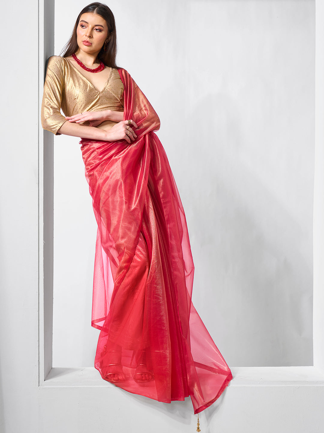 Red Gold Tissue Net Solid Texture Saree With Graceful Gold Cotted