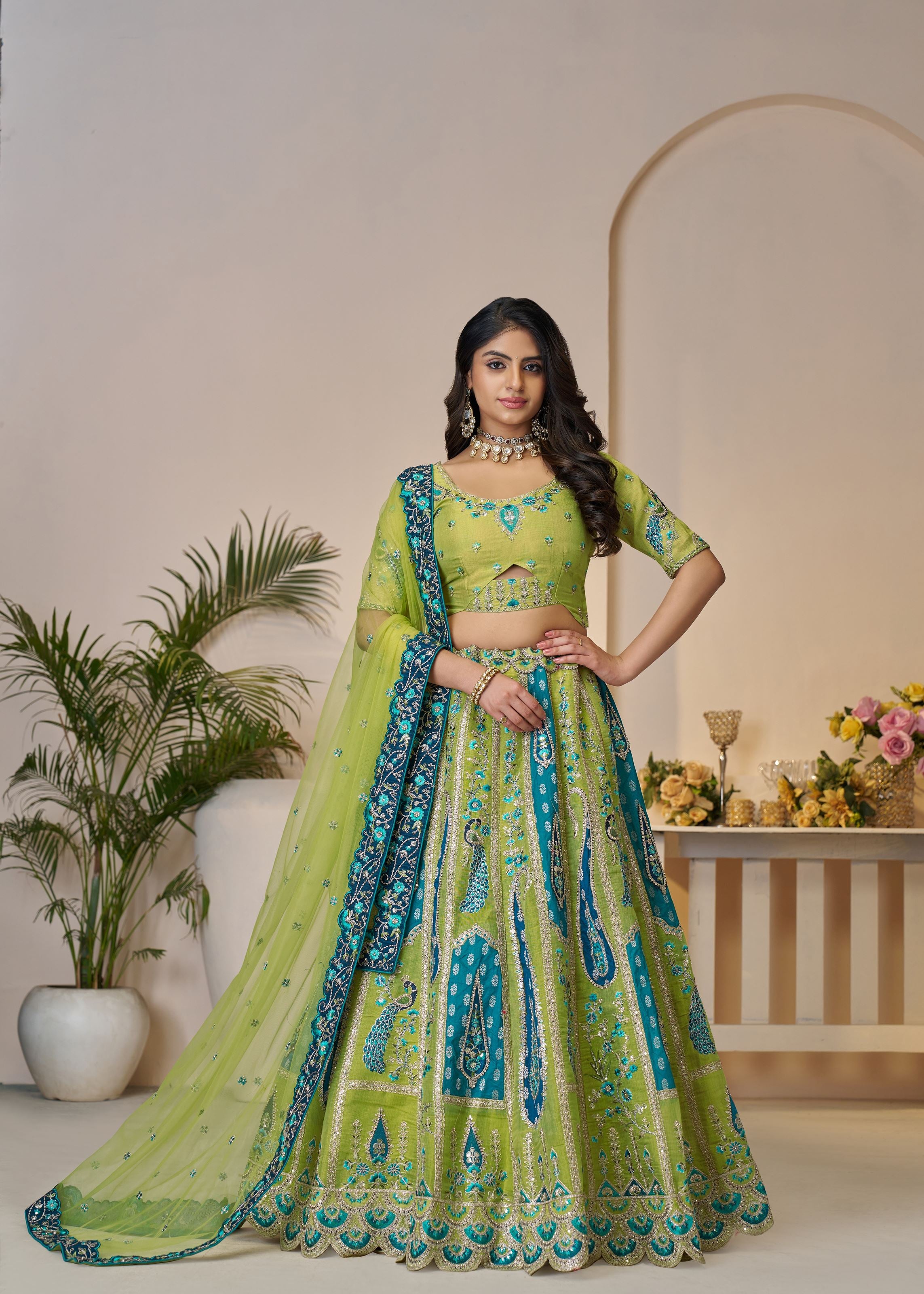 Royal Grandeur Bridal Green Soft Net Lehenga With Paisley And Peacock Motifs