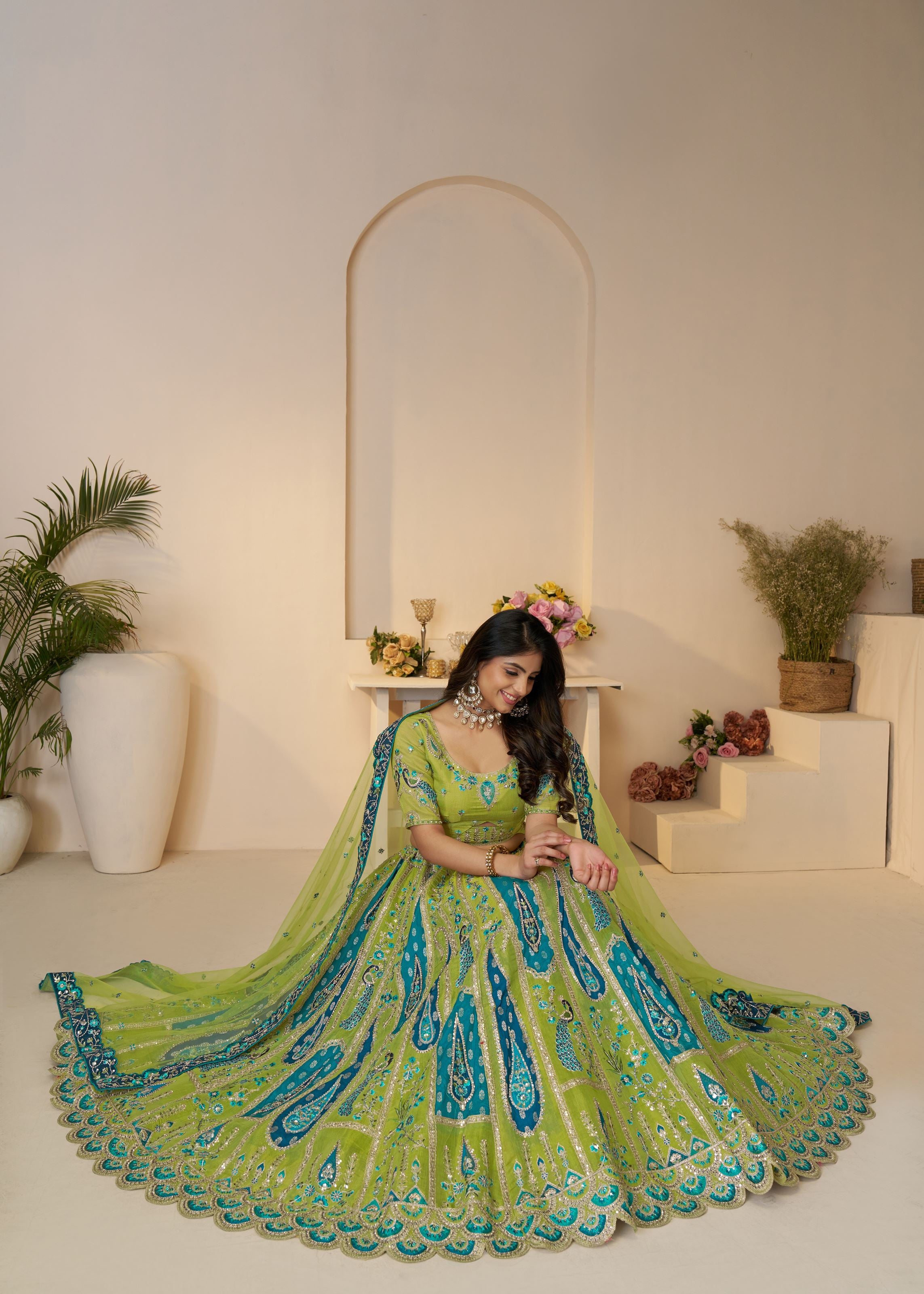 Royal Grandeur Bridal Green Soft Net Lehenga With Paisley And Peacock Motifs
