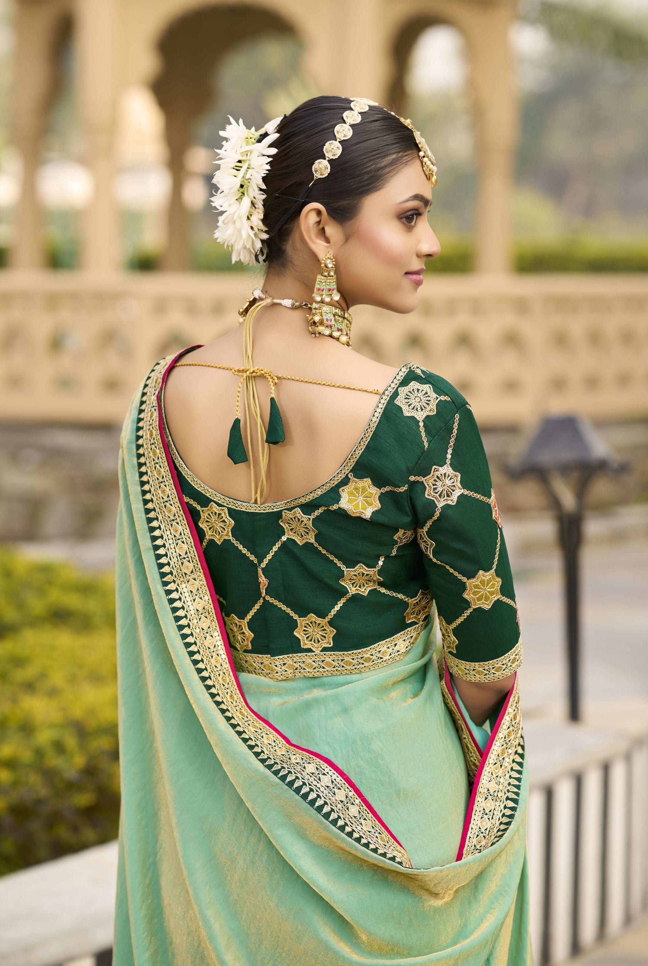 Sea Green Georgette Plain Saree With Embroidered Lace Border