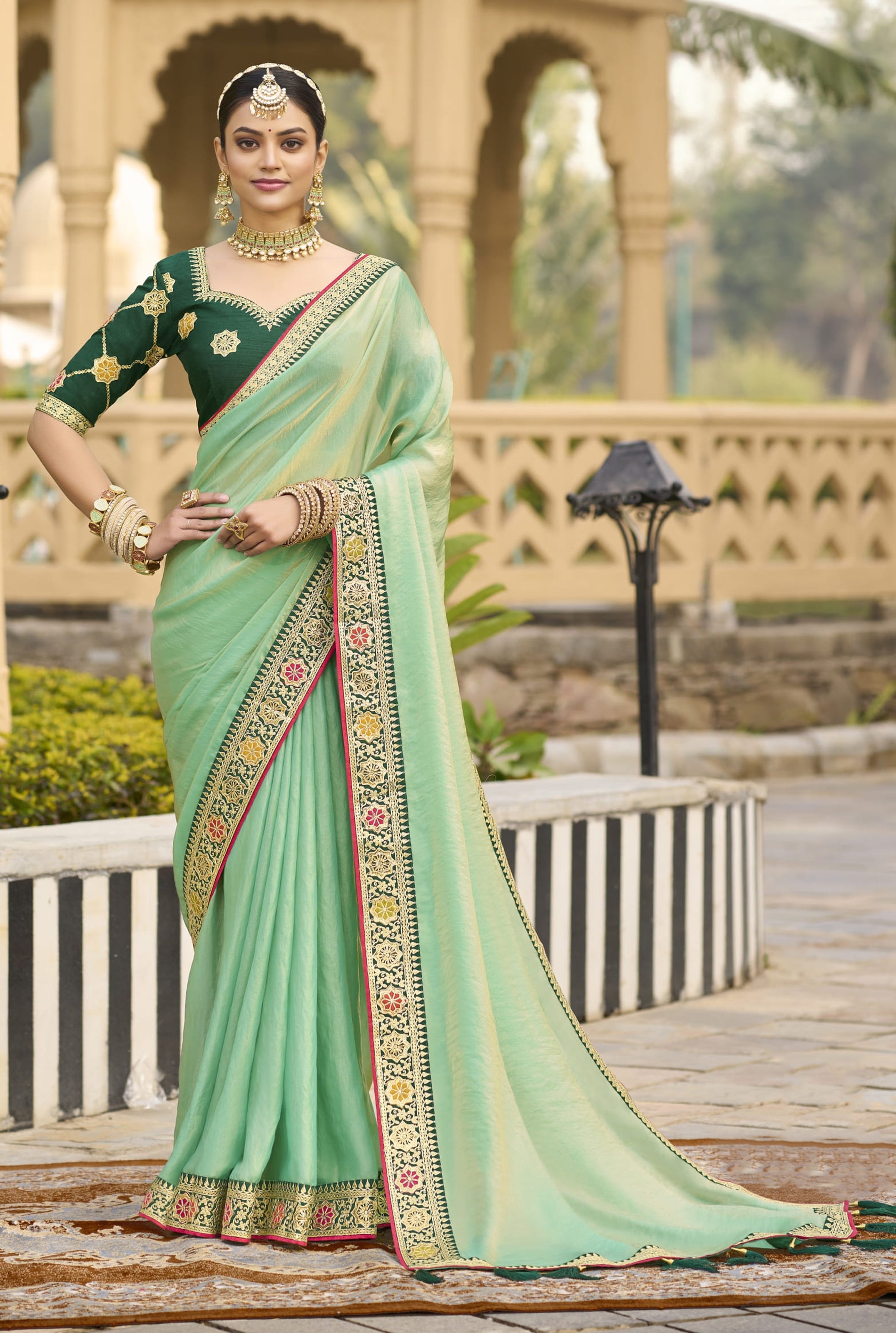 Sea Green Georgette Plain Saree With Embroidered Lace Border