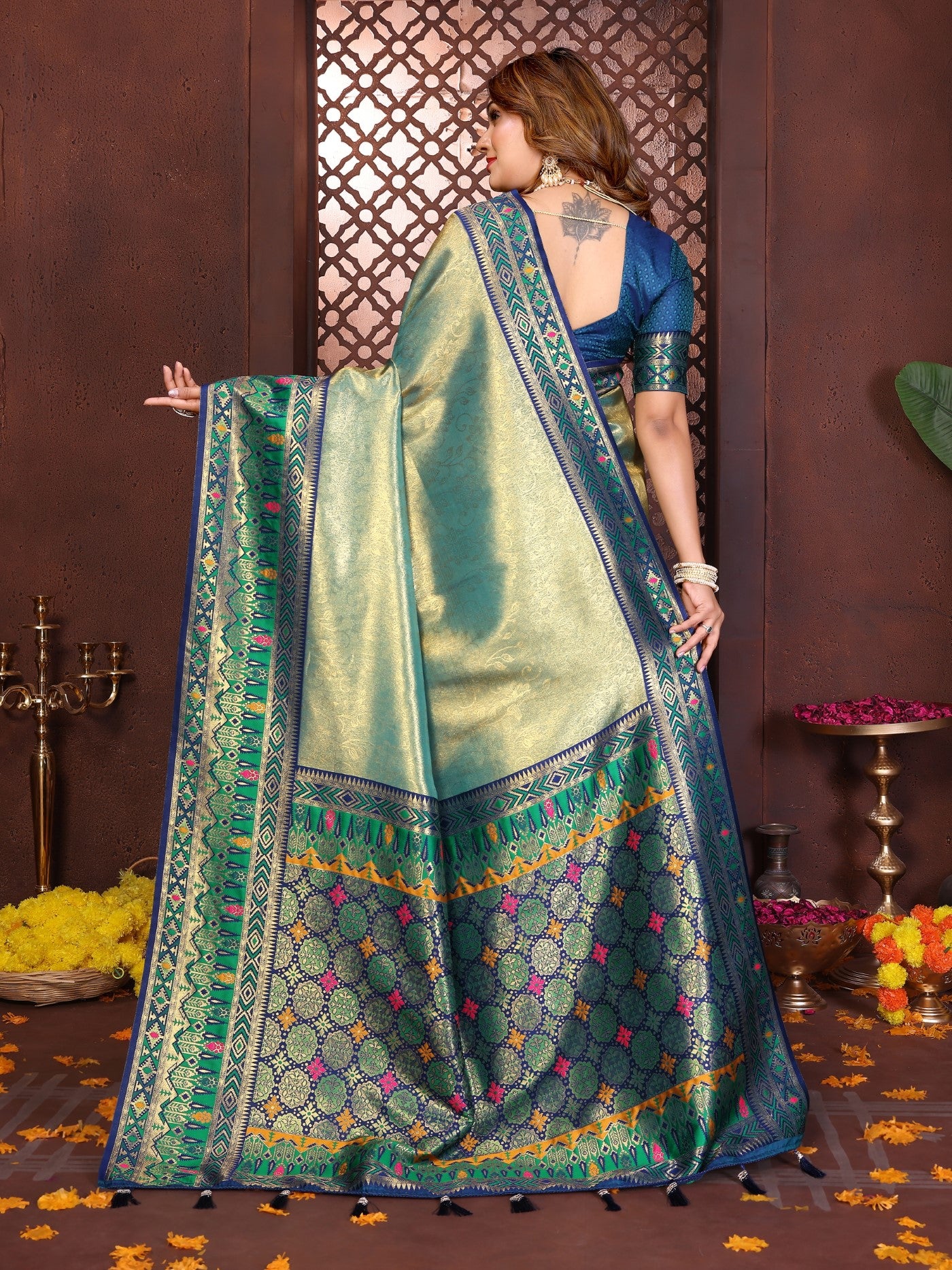 Sea Green Tissue Silk Saree With Traditional Weaving