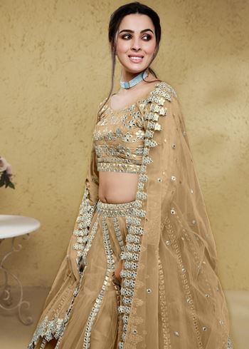 Stunning Beige Foil Work Net Wedding Lehenga Choli With Dupatta