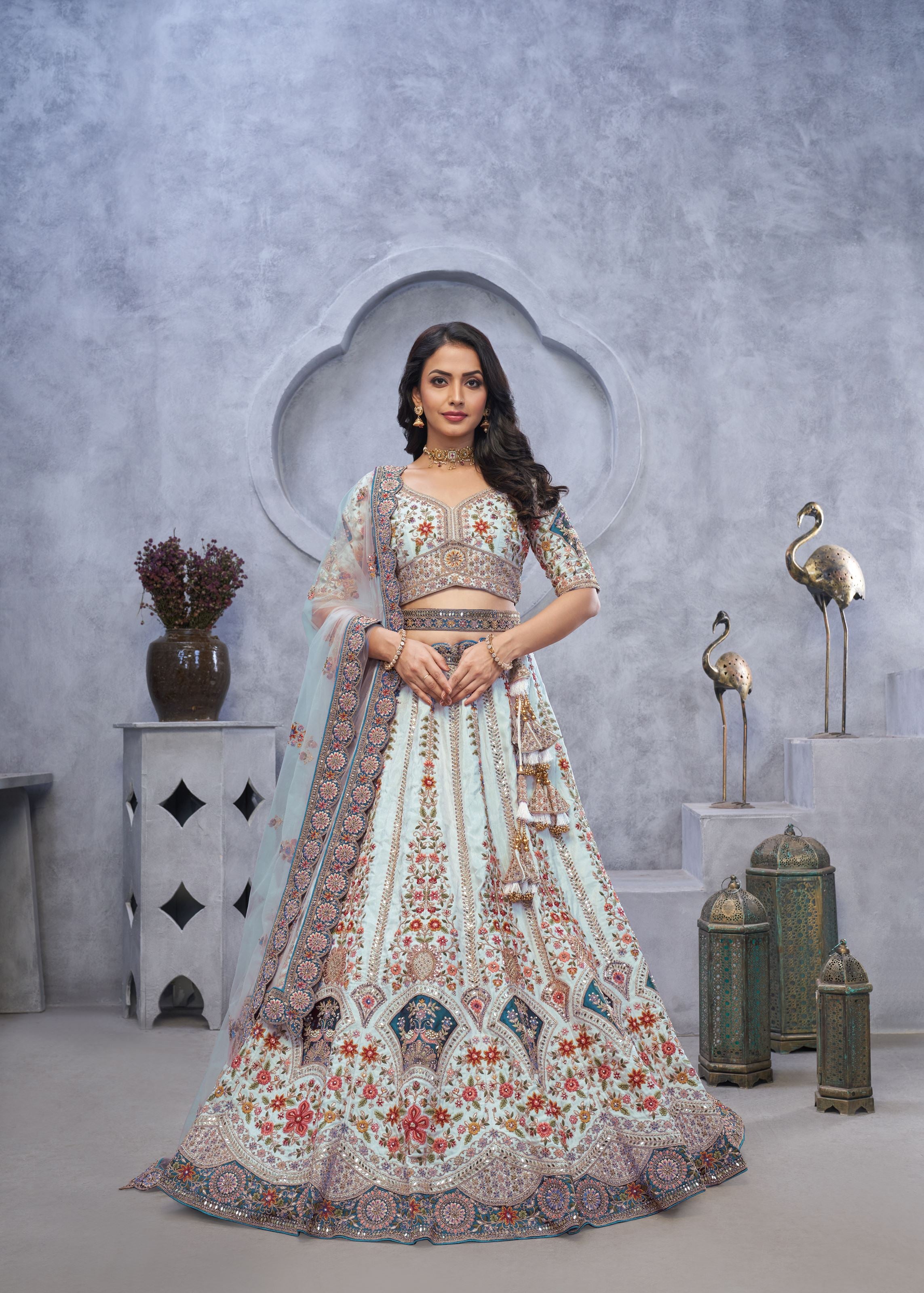 Stunning Sky Blue Lehenga Choli With Zari Paisley Embroidery, Silk Patches, And Regal Peacock Motifs