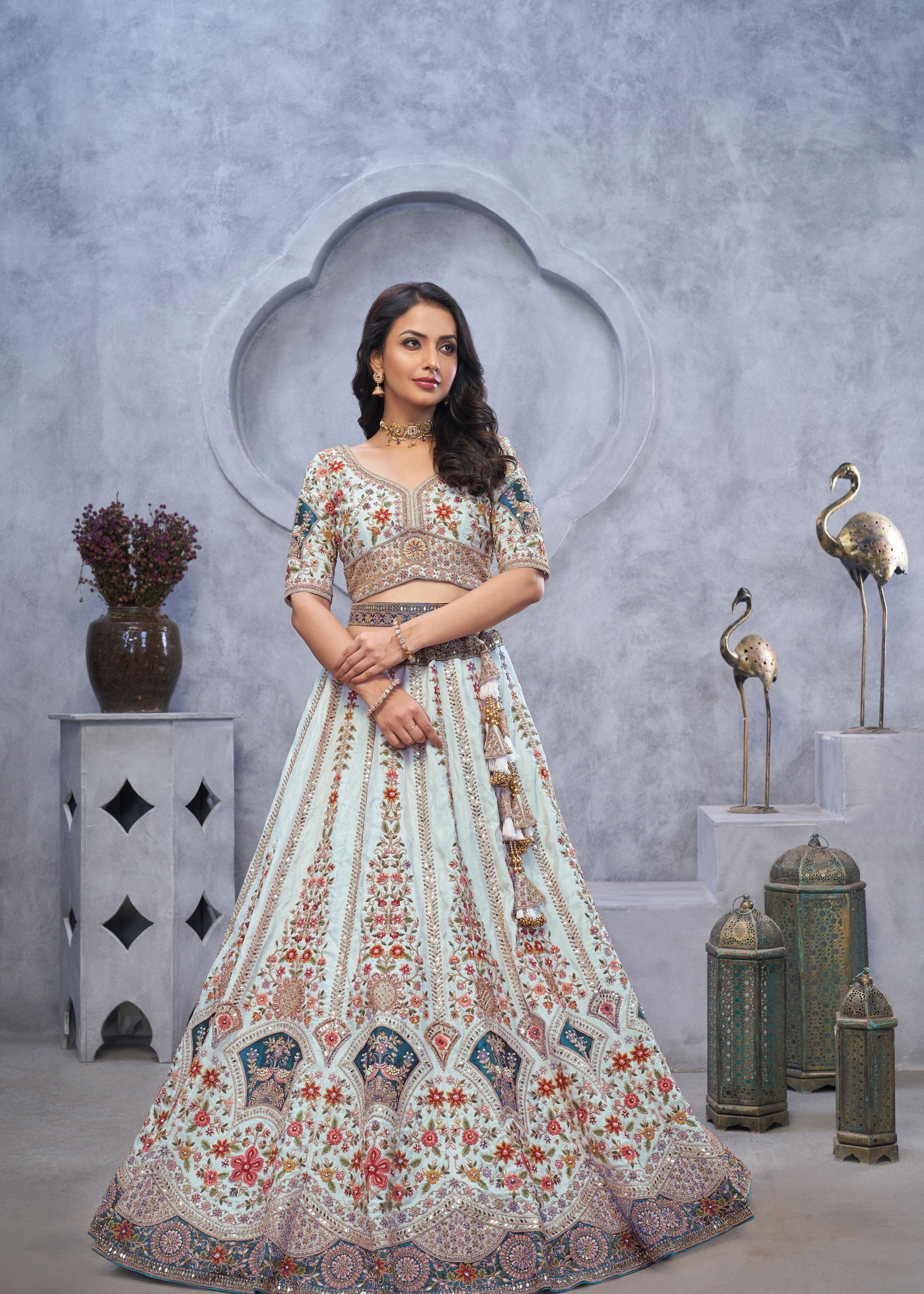 Stunning Sky Blue Lehenga Choli With Zari Paisley Embroidery, Silk Patches, And Regal Peacock Motifs