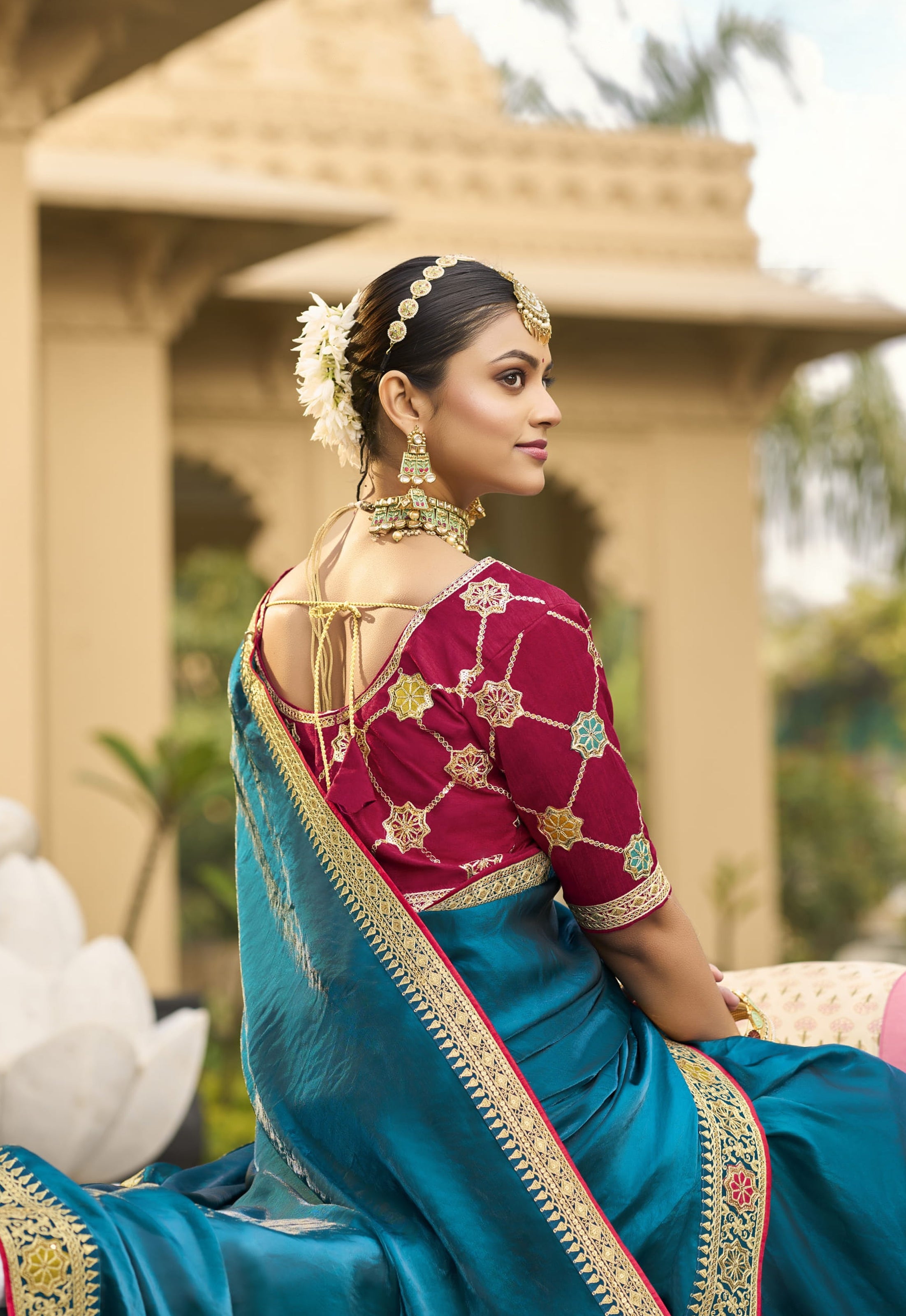 Teal Blue Georgette Plain Saree With Embroidered Lace Border